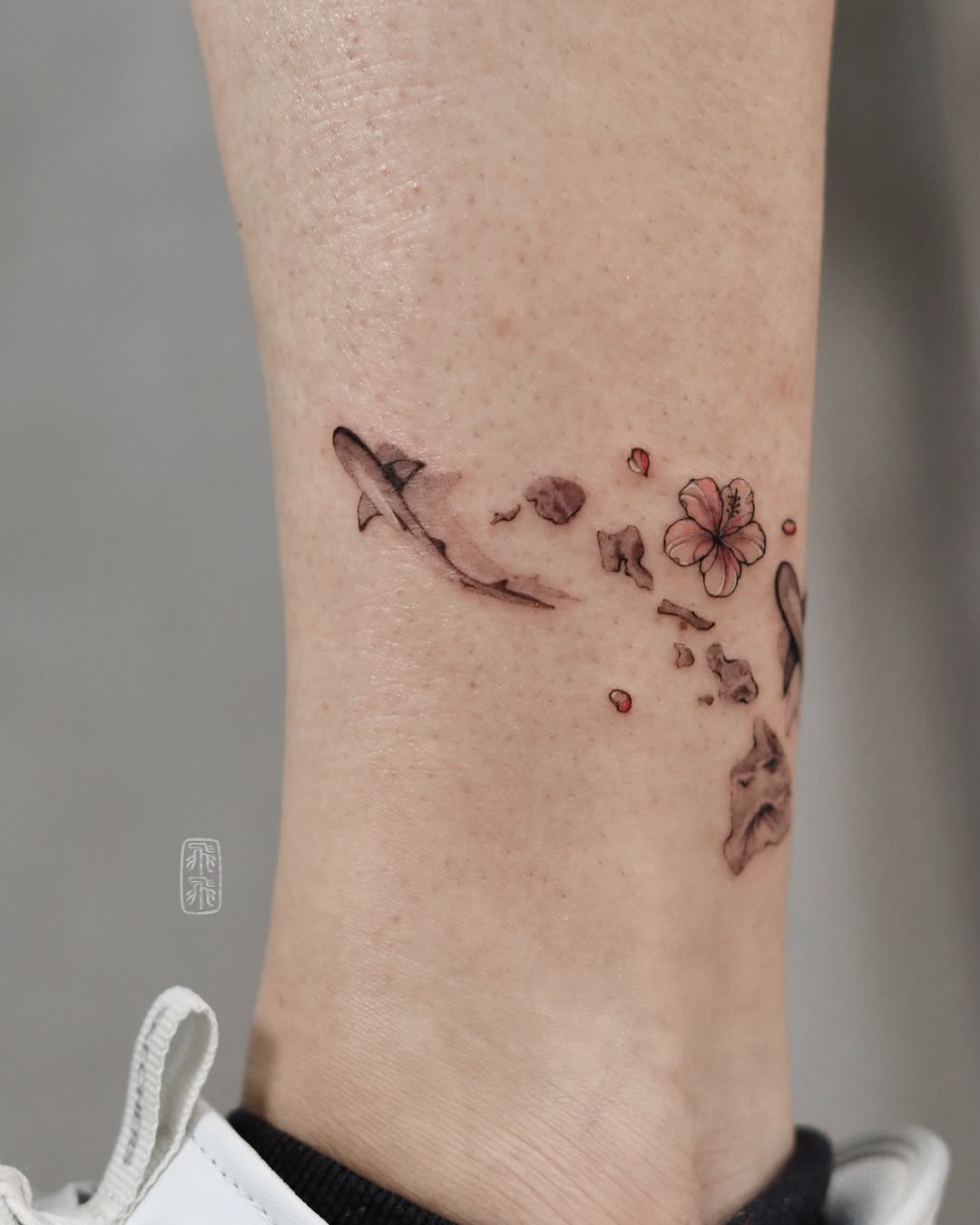 Cherry blossom and airplane dotwork tattoo on the forearm by Phoebe H.