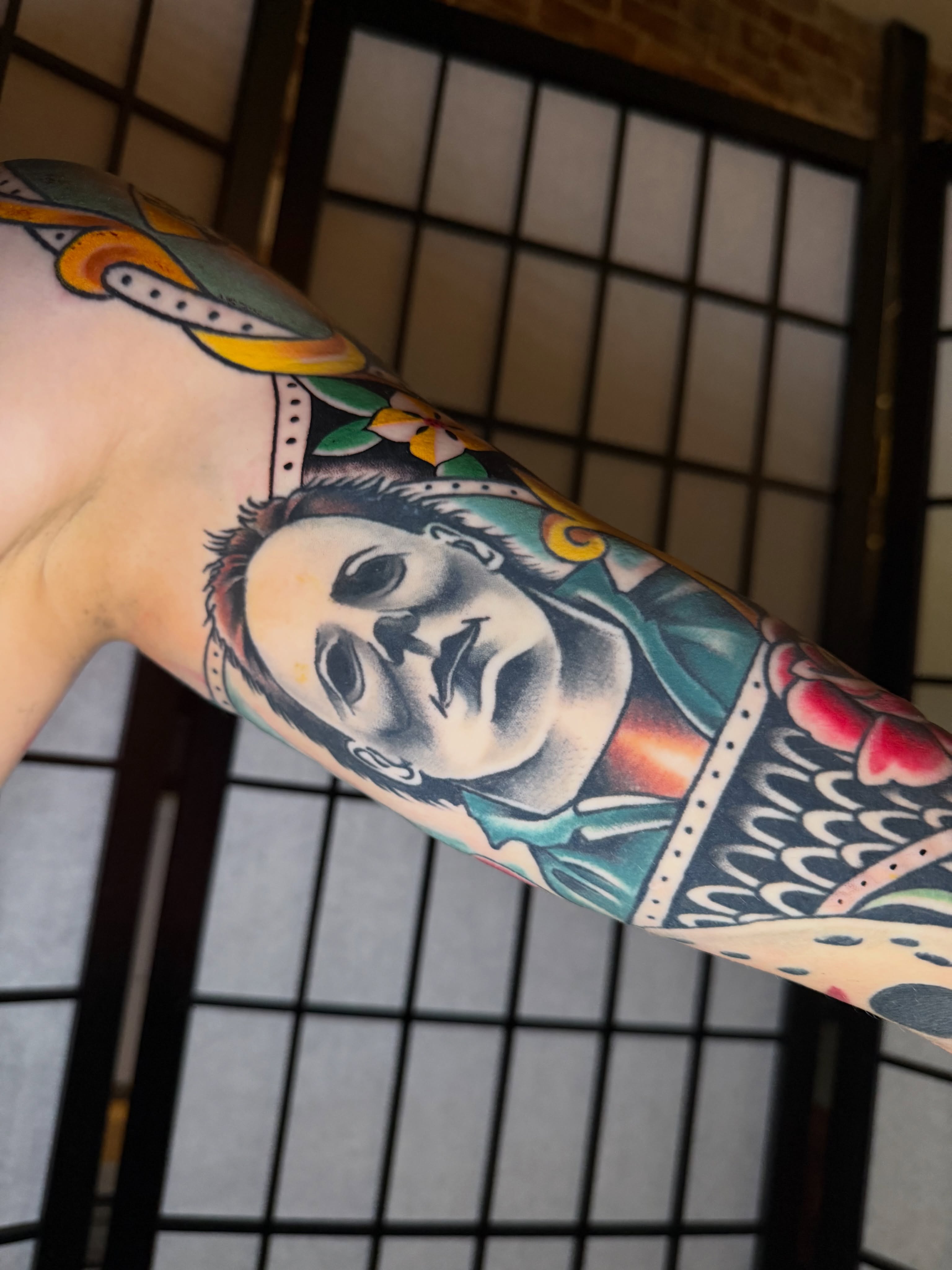 Portrait American traditional tattoo on the forearm by Kevin R. Onley