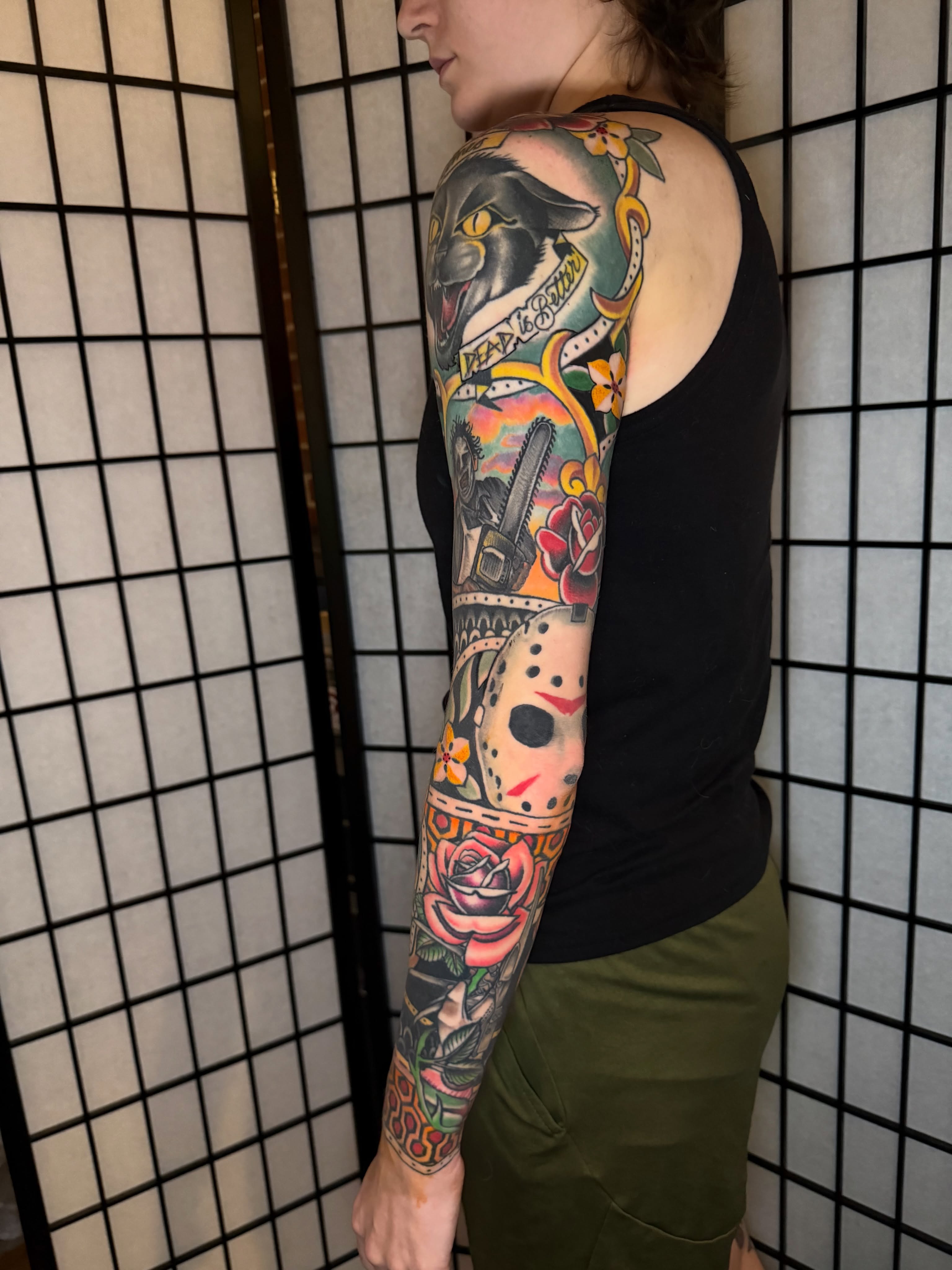 Horror movie characters American traditional tattoo on the upper arm by Kevin R. Onley