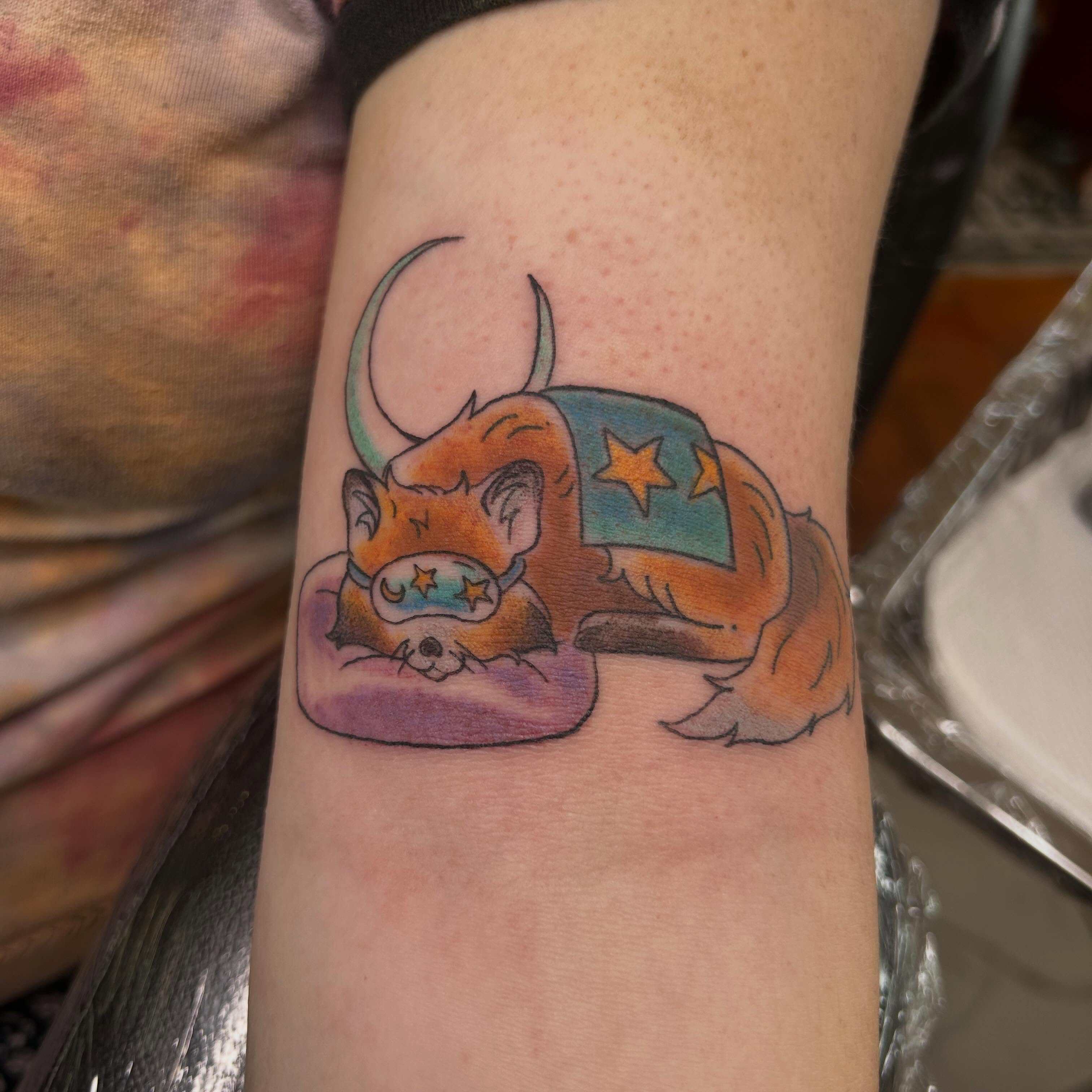 Sleeping bison dotwork tattoo on the forearm by Reilley Earles