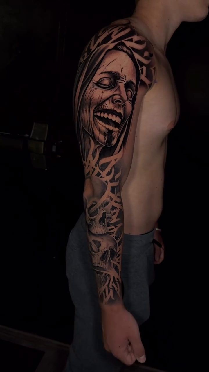 Screaming face with abstract background realism tattoo by Connor Arvay
