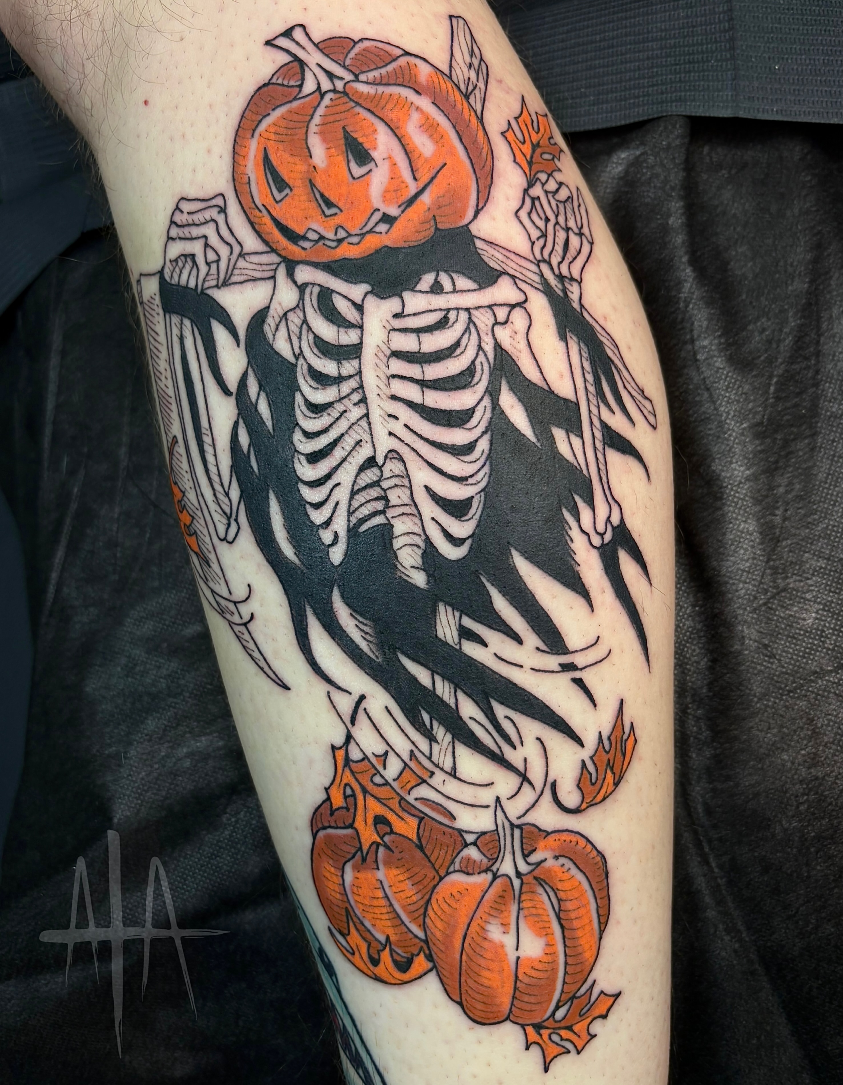 Pumpkin-headed skeleton American traditional tattoo on the forearm by ๐๐๐ฏ๐ฌ๐ซ ๐๐ก๐ก๐๐ช๐ฐ