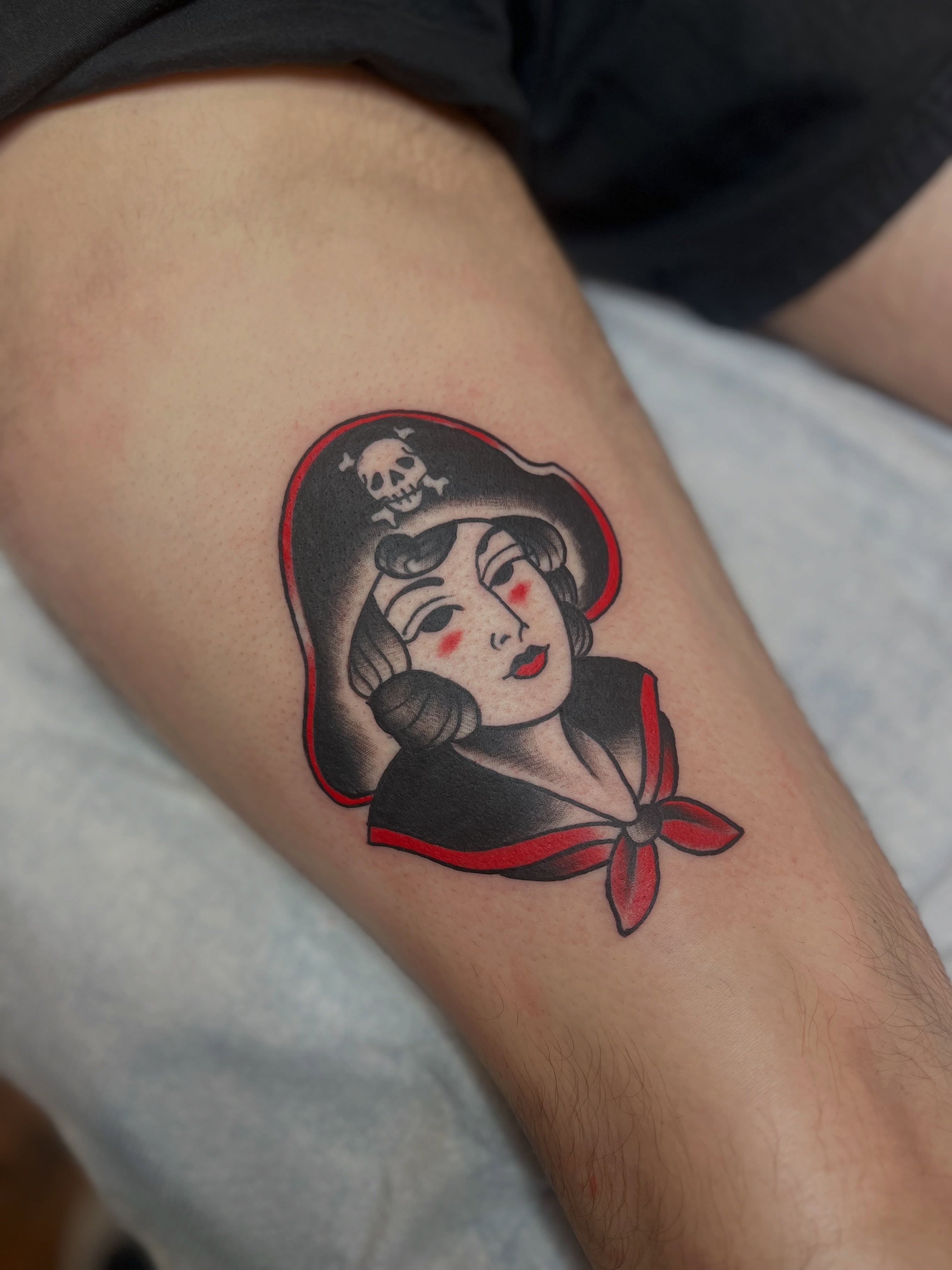Woman pirate American traditional tattoo on the forearm by Fizzy Jizzles, Worcester, England