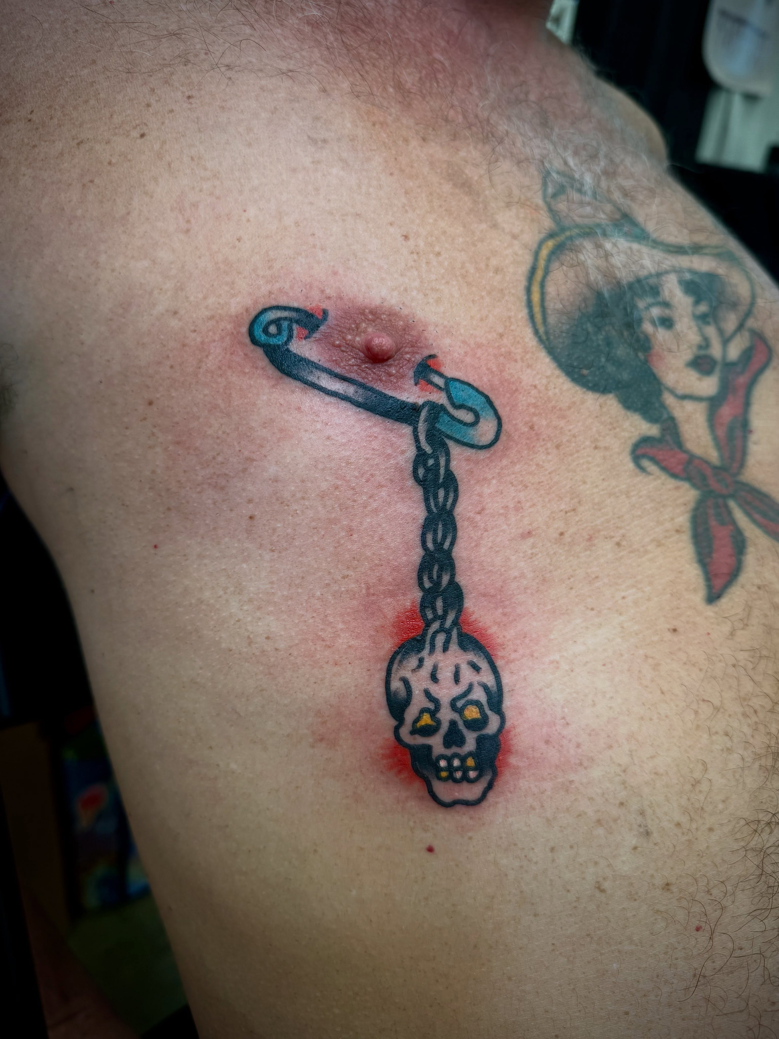 Anchor with skull American traditional tattoo on the chest by Victoria Lagano NYC Traditional Tattoos