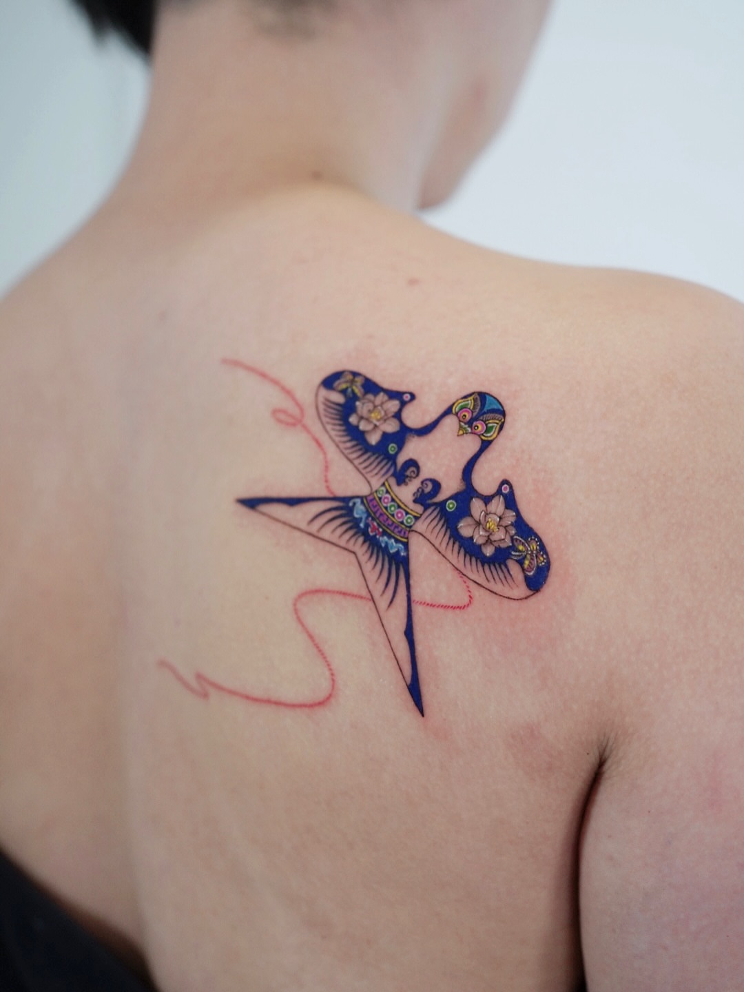 Butterfly new school tattoo on the back by Lily, Los Angeles, California