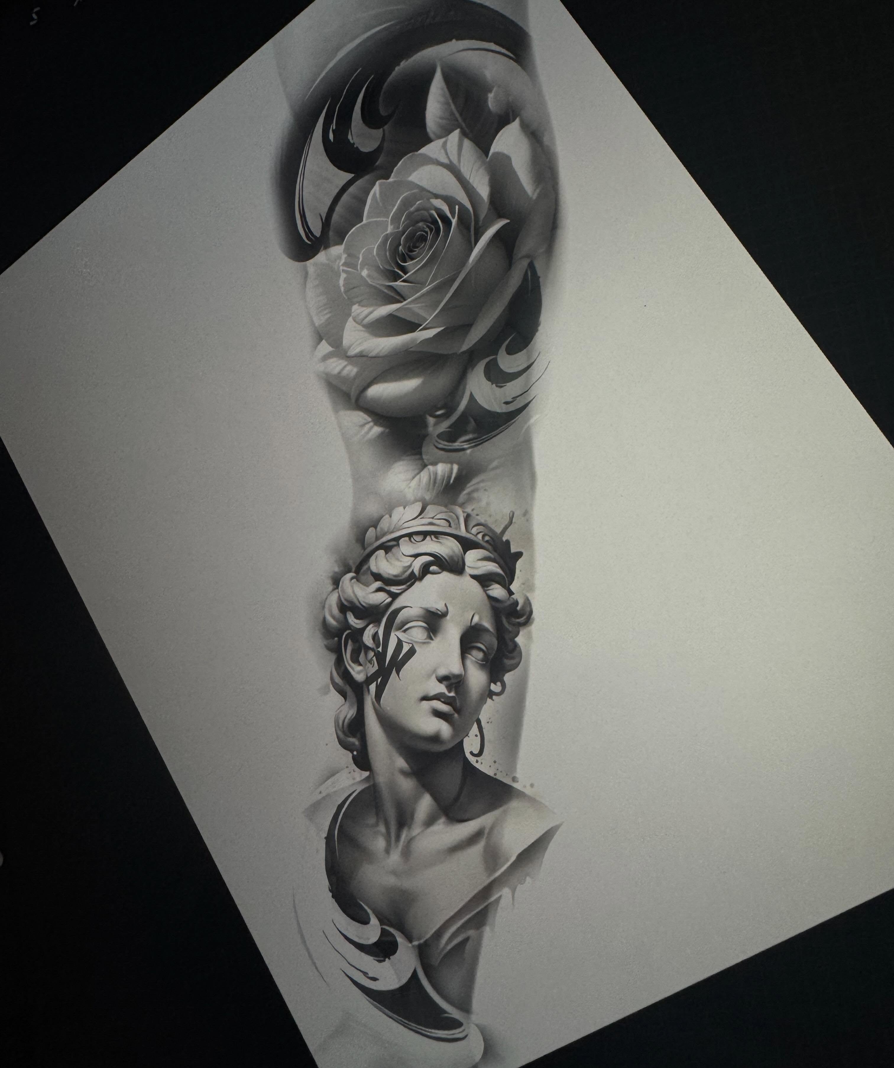 Statue bust with rose realism tattoo on the forearm by Keith Smith