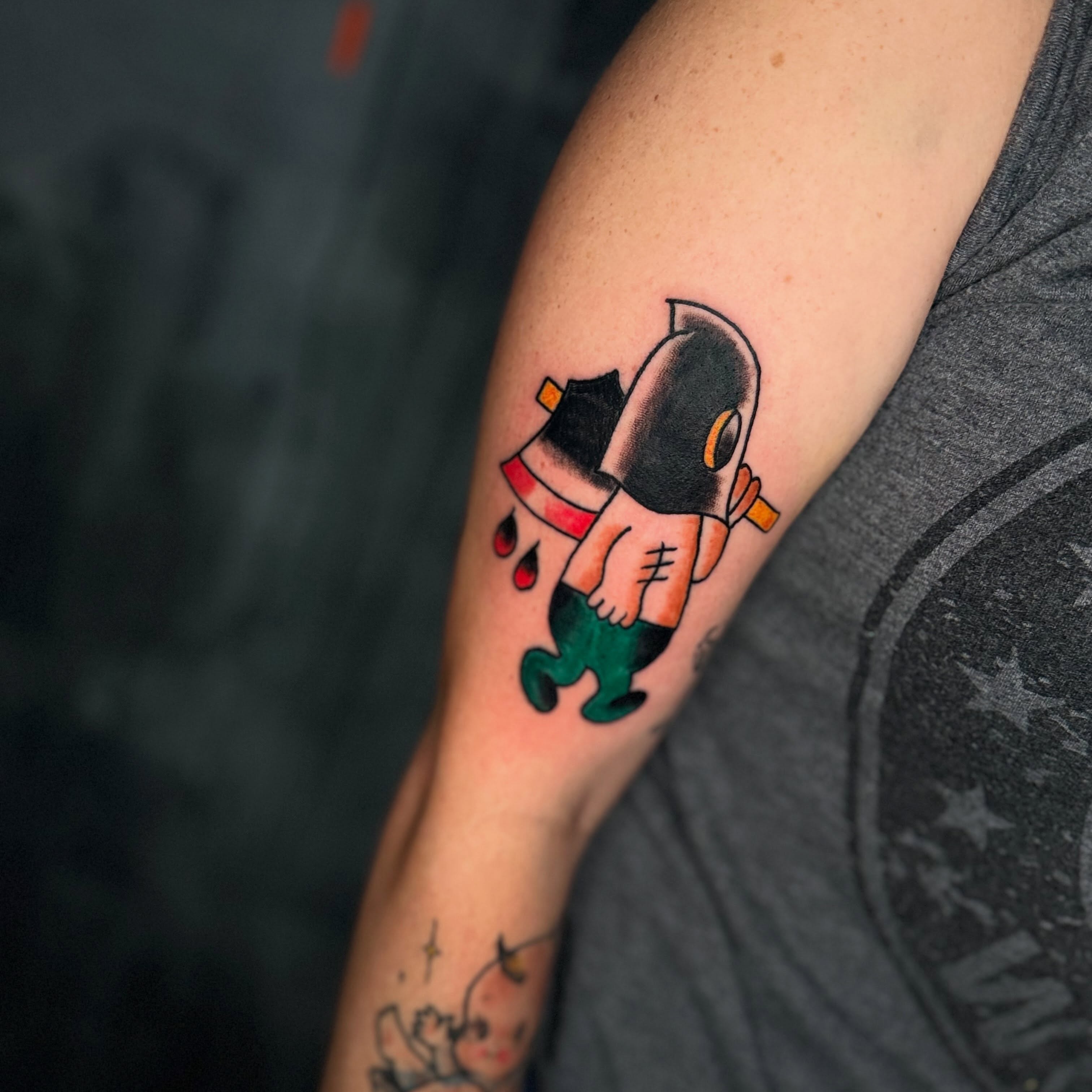 Robot holding axe neo-traditional tattoo on the forearm by Camilo