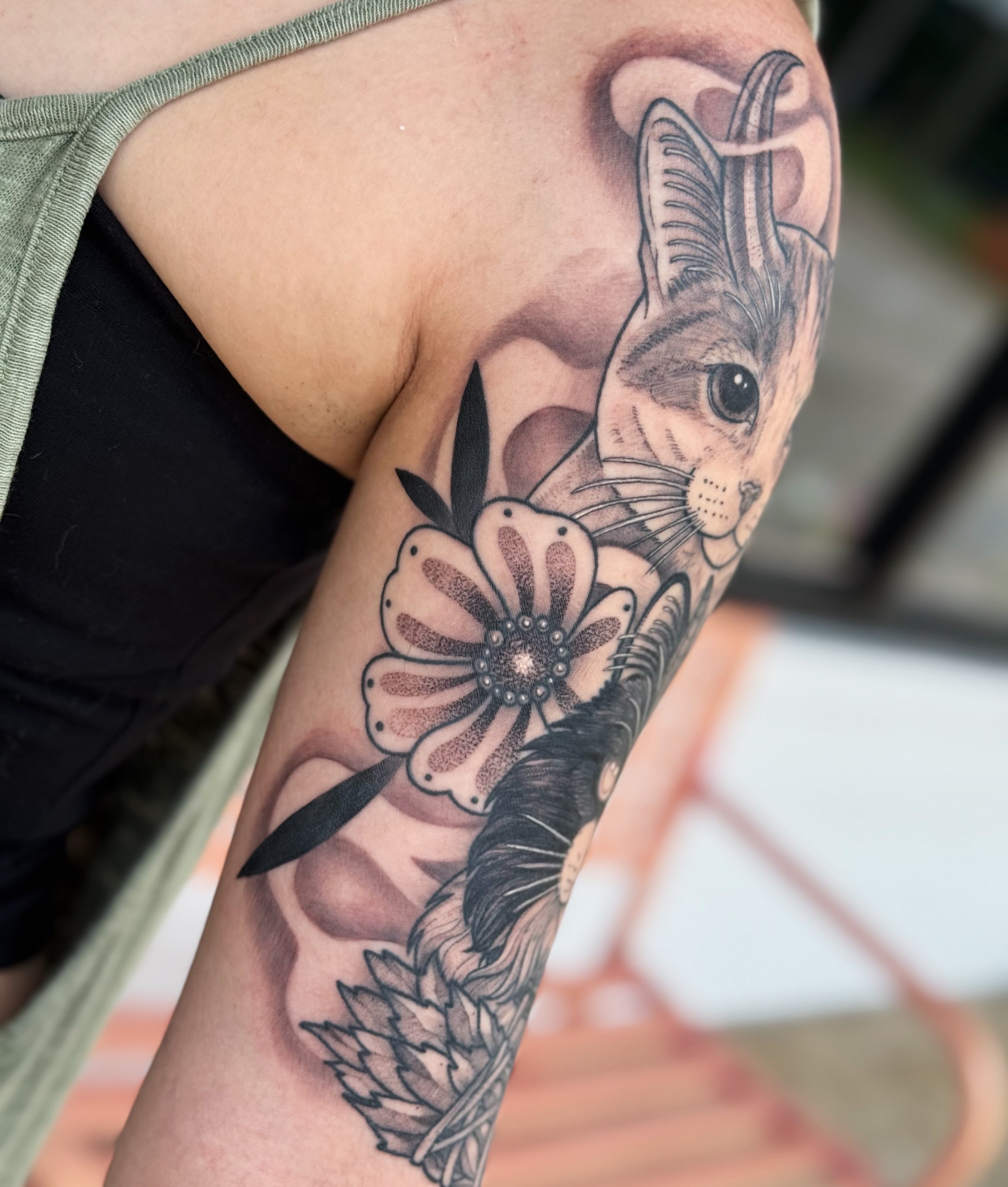 Tattoo by @flying_tiger_social_club — realism, dotwork