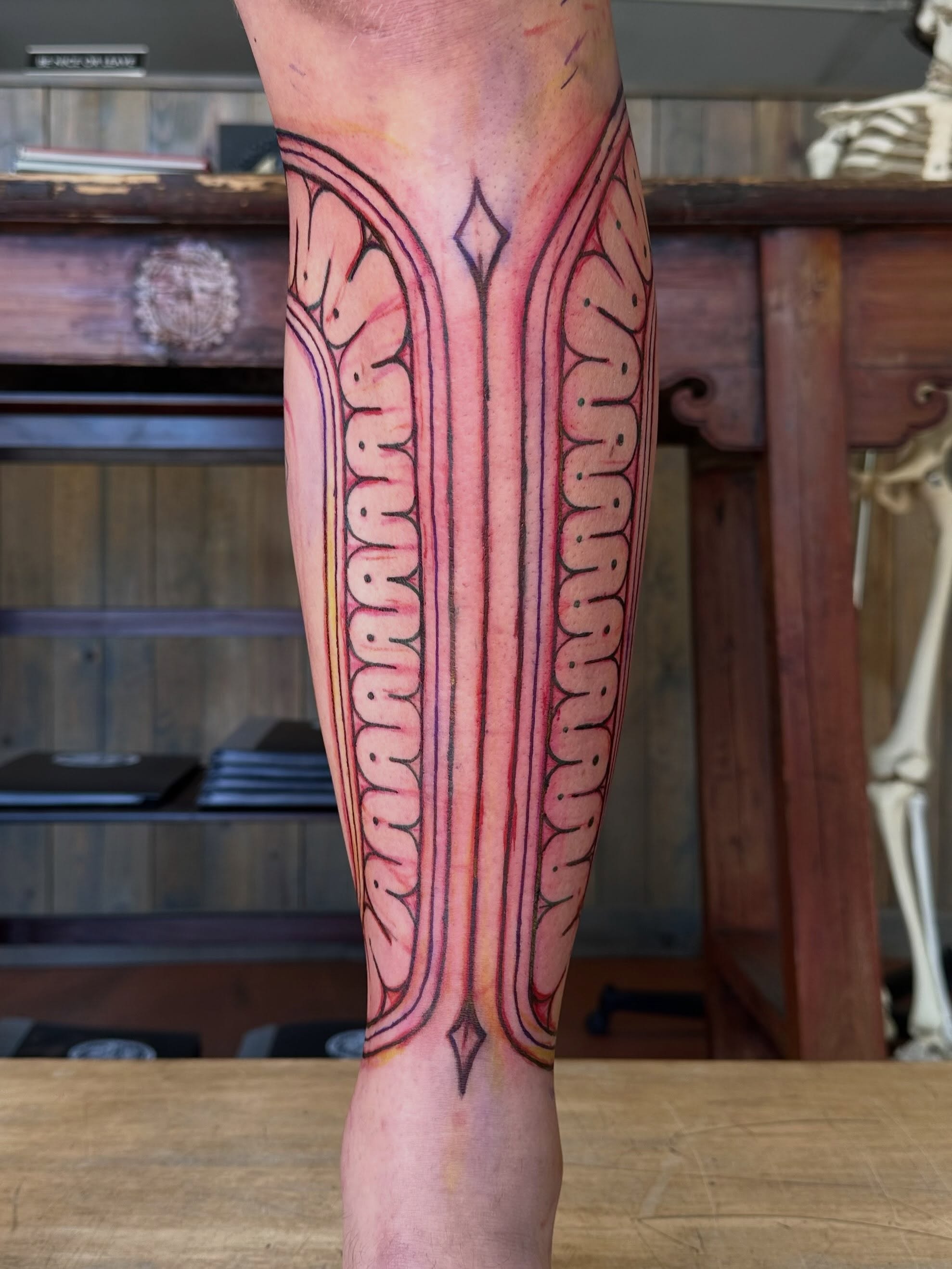 Geometric pattern geometric tattoo on the calf by Owlyn Madrone