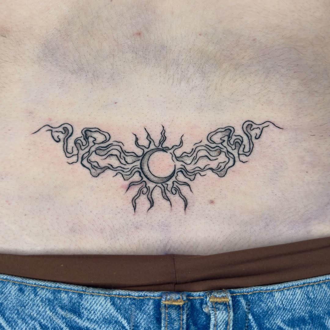 Sun and flames black and grey tattoo on the chest by Charlotte (Luna), Seattle, Washington