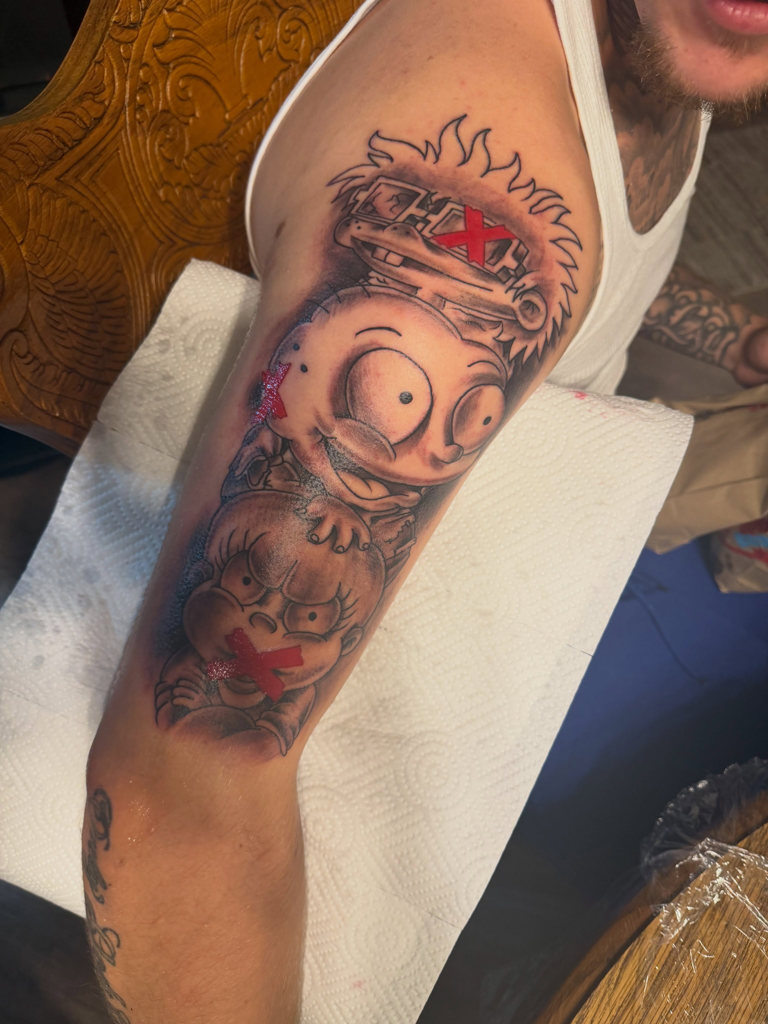 Cartoon characters realism tattoo on the forearm by Tattoosbydevon