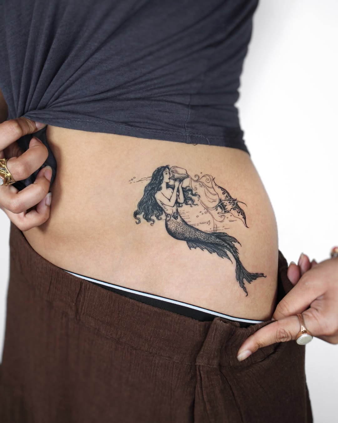 Mermaid black and grey tattoo on the torso by Tatmostat