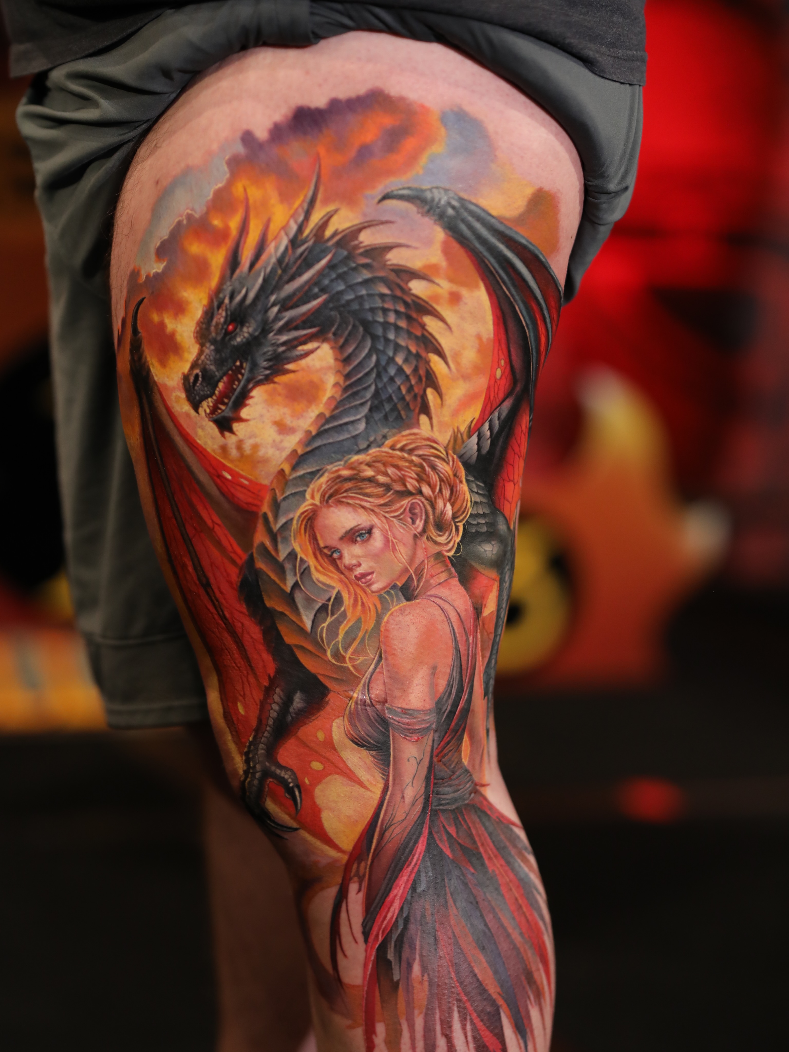 Dragon and woman realism tattoo on the thigh by Durb
