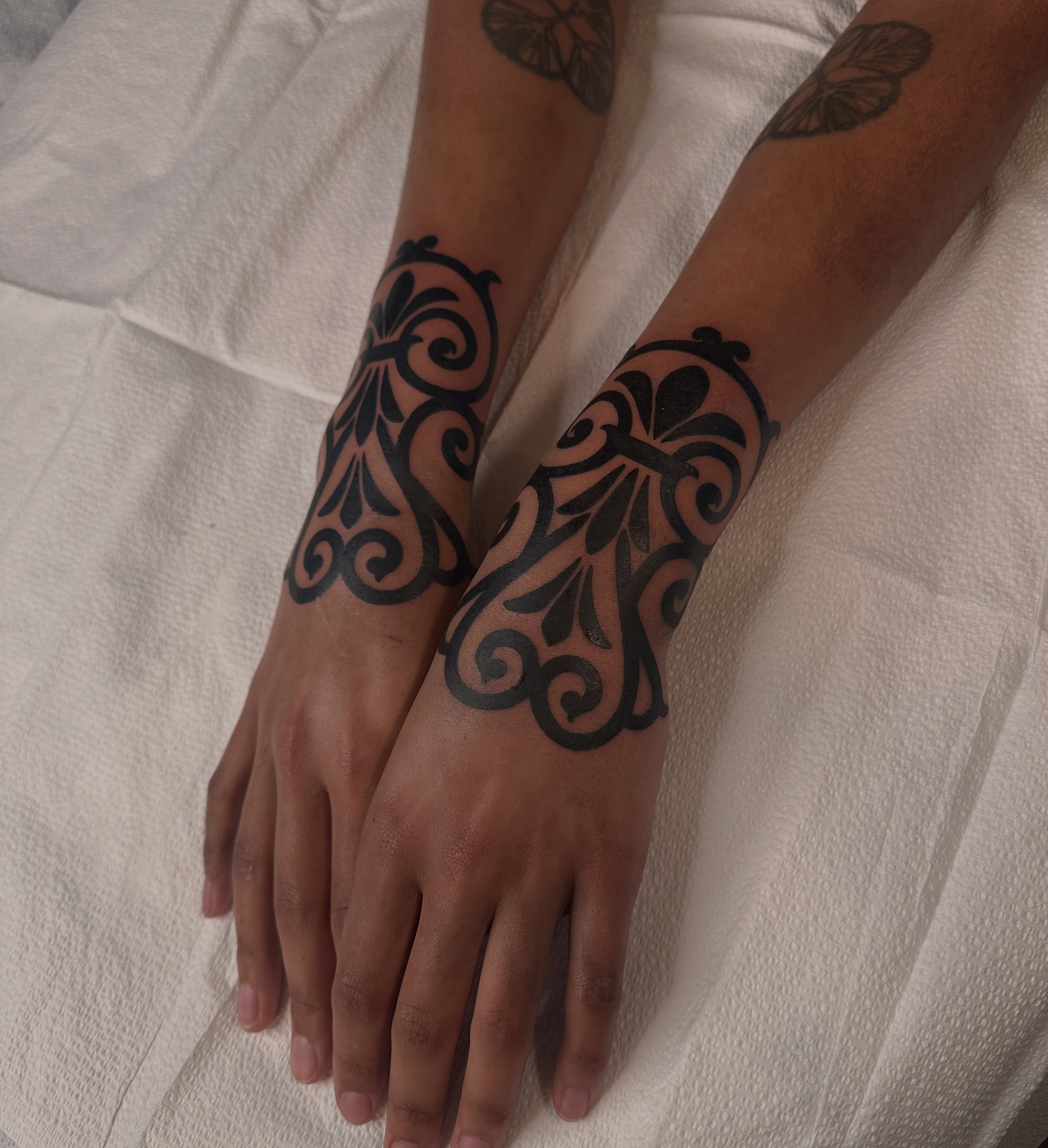Scrollwork tribal tattoo on the forearm by abigail 🌸