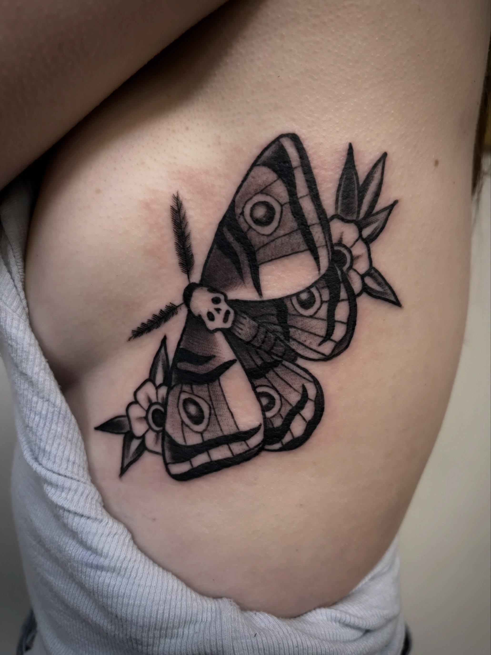 Butterfly black and grey tattoo on the chest by Trav, Bayville, New Jersey