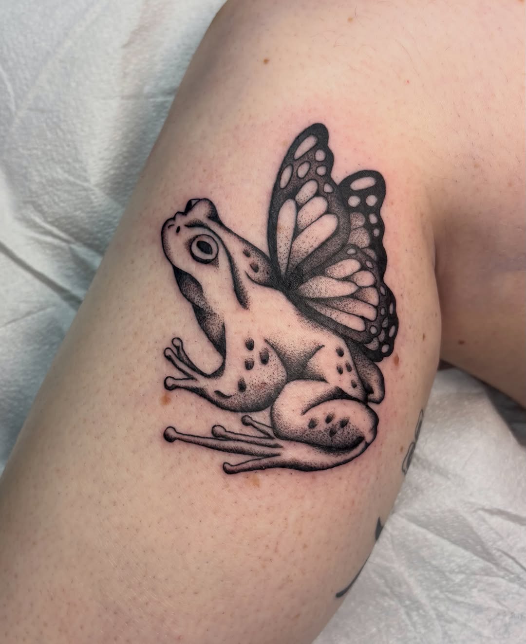 Frog with butterfly wings dotwork tattoo on the forearm by ✨madison✨, Portland, Oregon