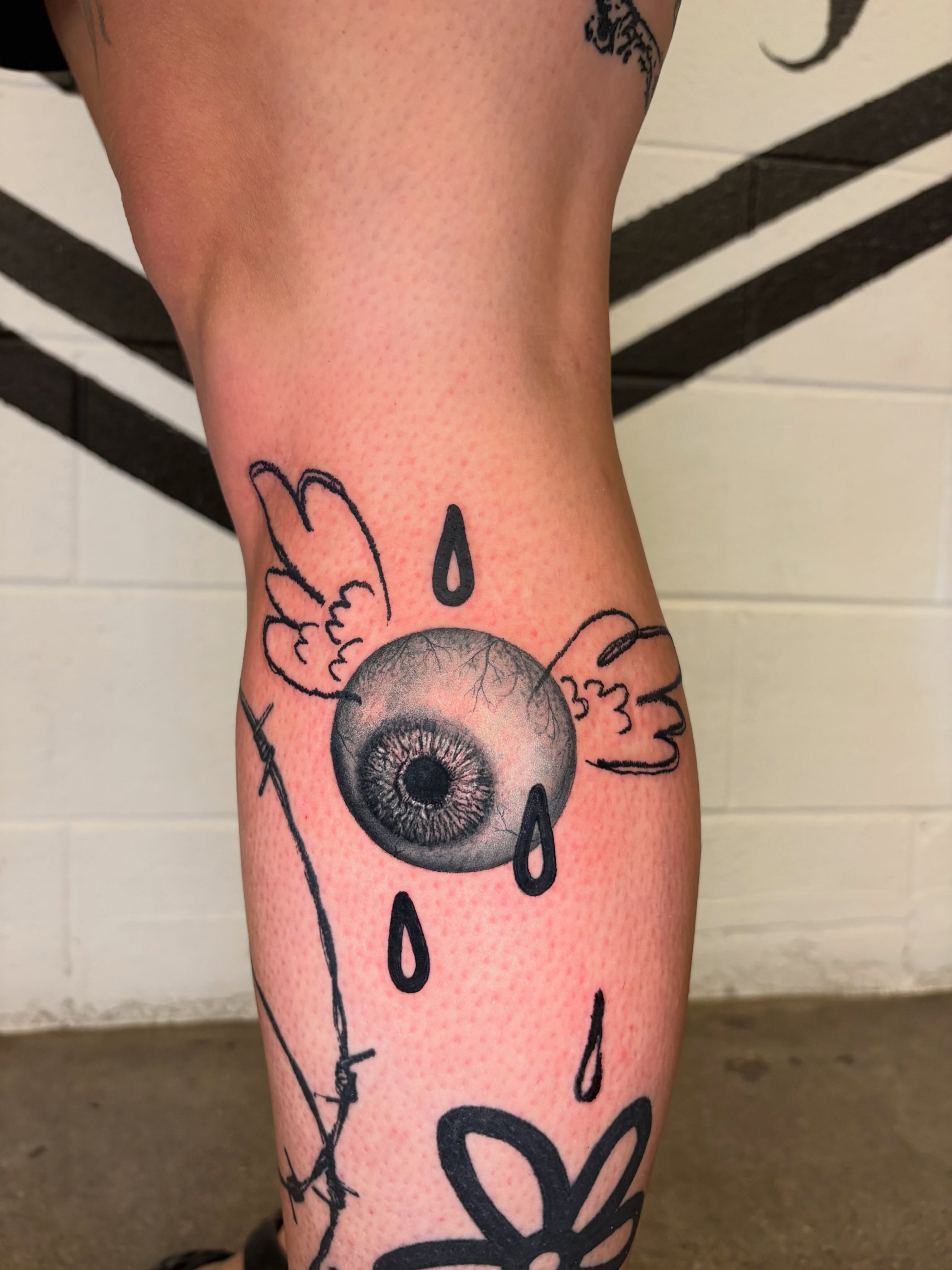 Eye with wings realism tattoo on the forearm by @lil_stinker_5000, Portland, Oregon