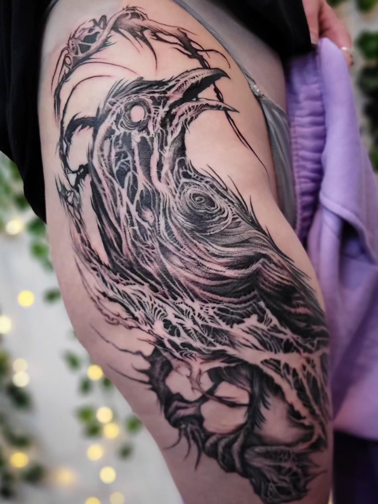 Crow dark realism tattoo on the thigh by Uku Tattoos, Cambridge, England