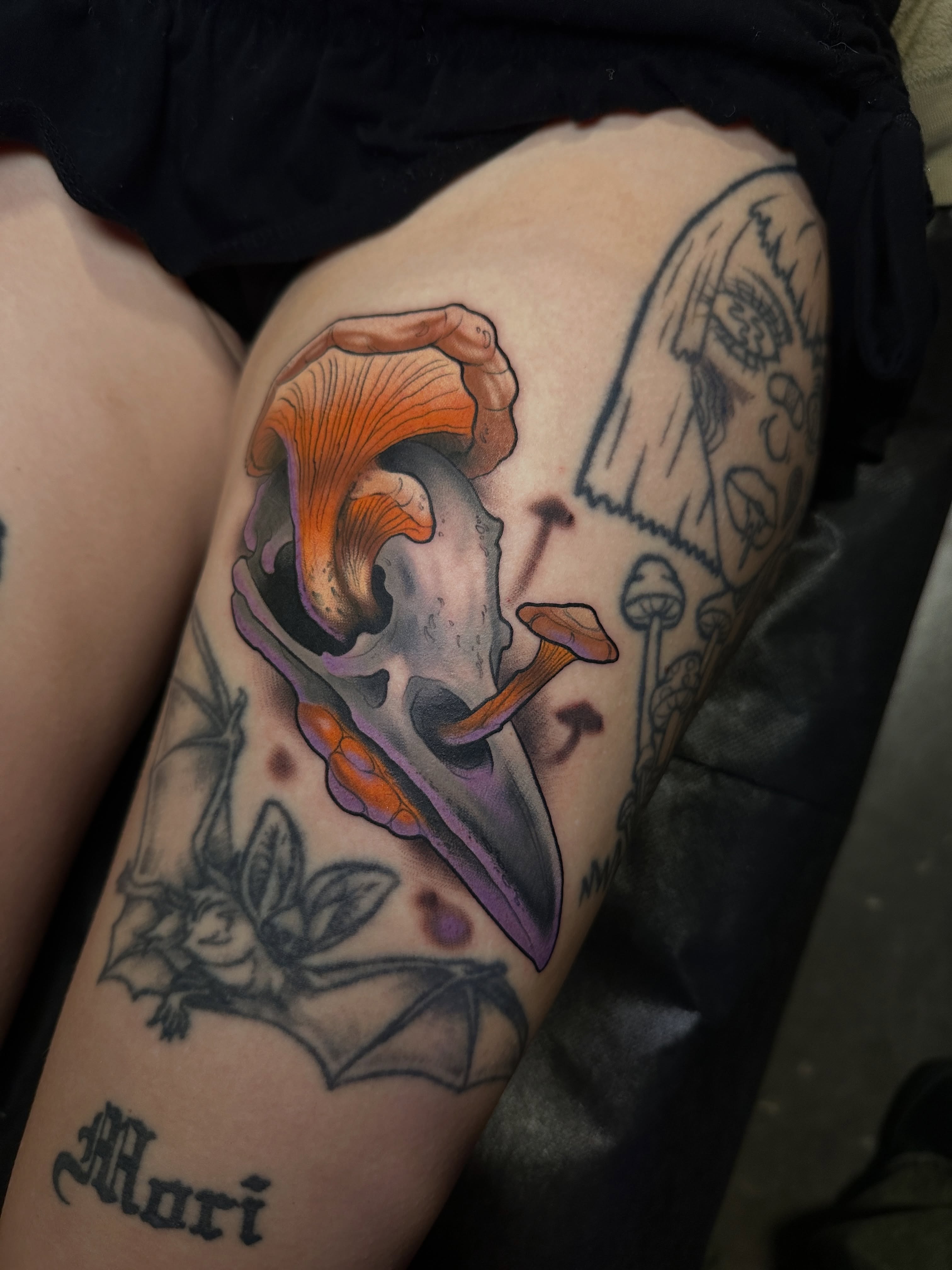 Mushroom skull dark realism tattoo on the thigh by Skylar Mangrum
