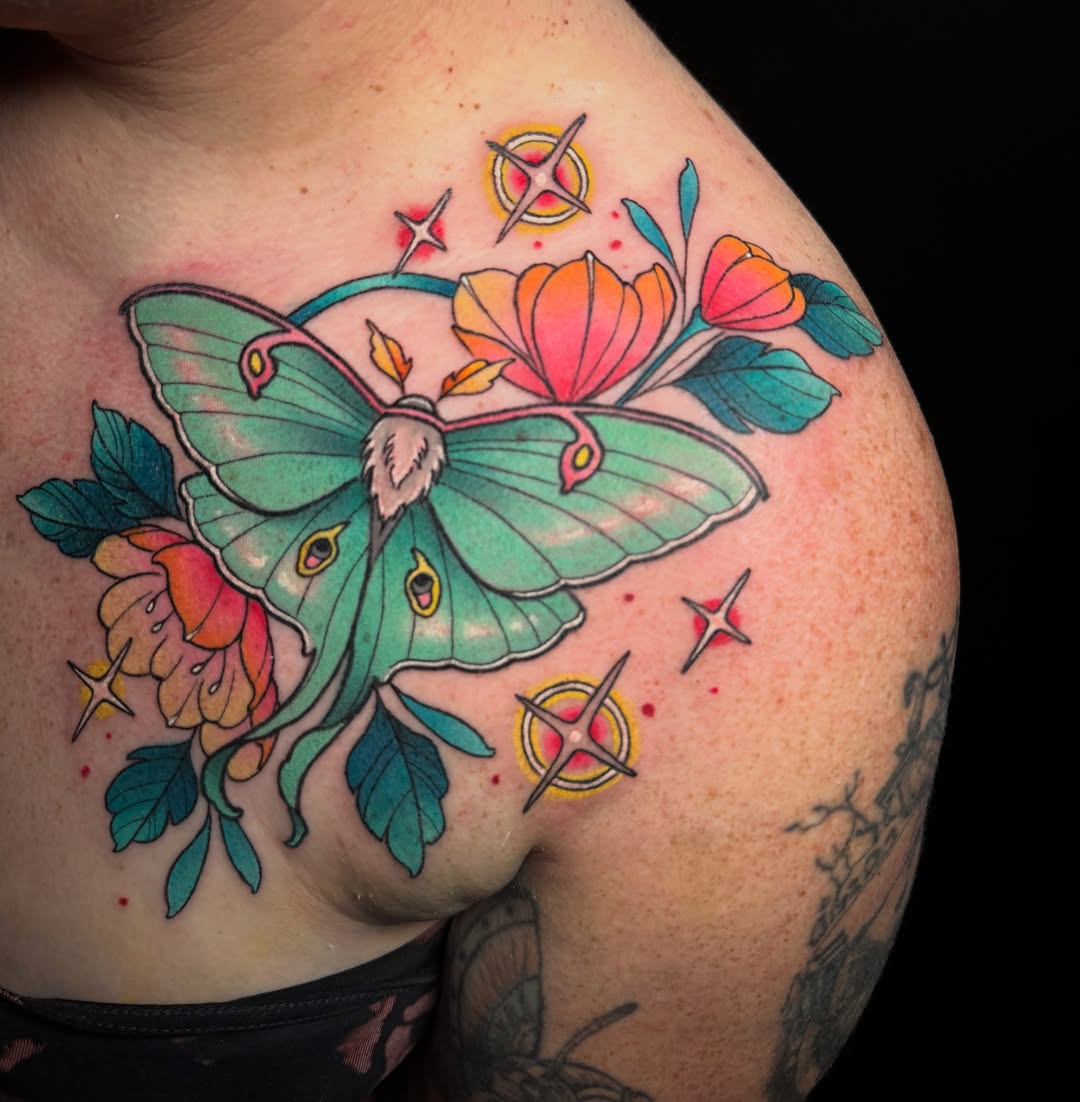 Butterfly and flowers new school tattoo on the shoulder by Dee Florian