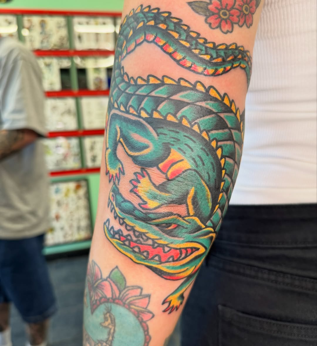 Alligator American traditional tattoo on the forearm by Kenny Kastro