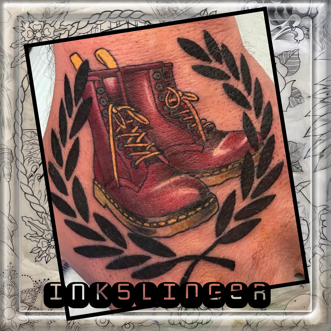 Boots realism tattoo on the forearm by Bryan Hunt