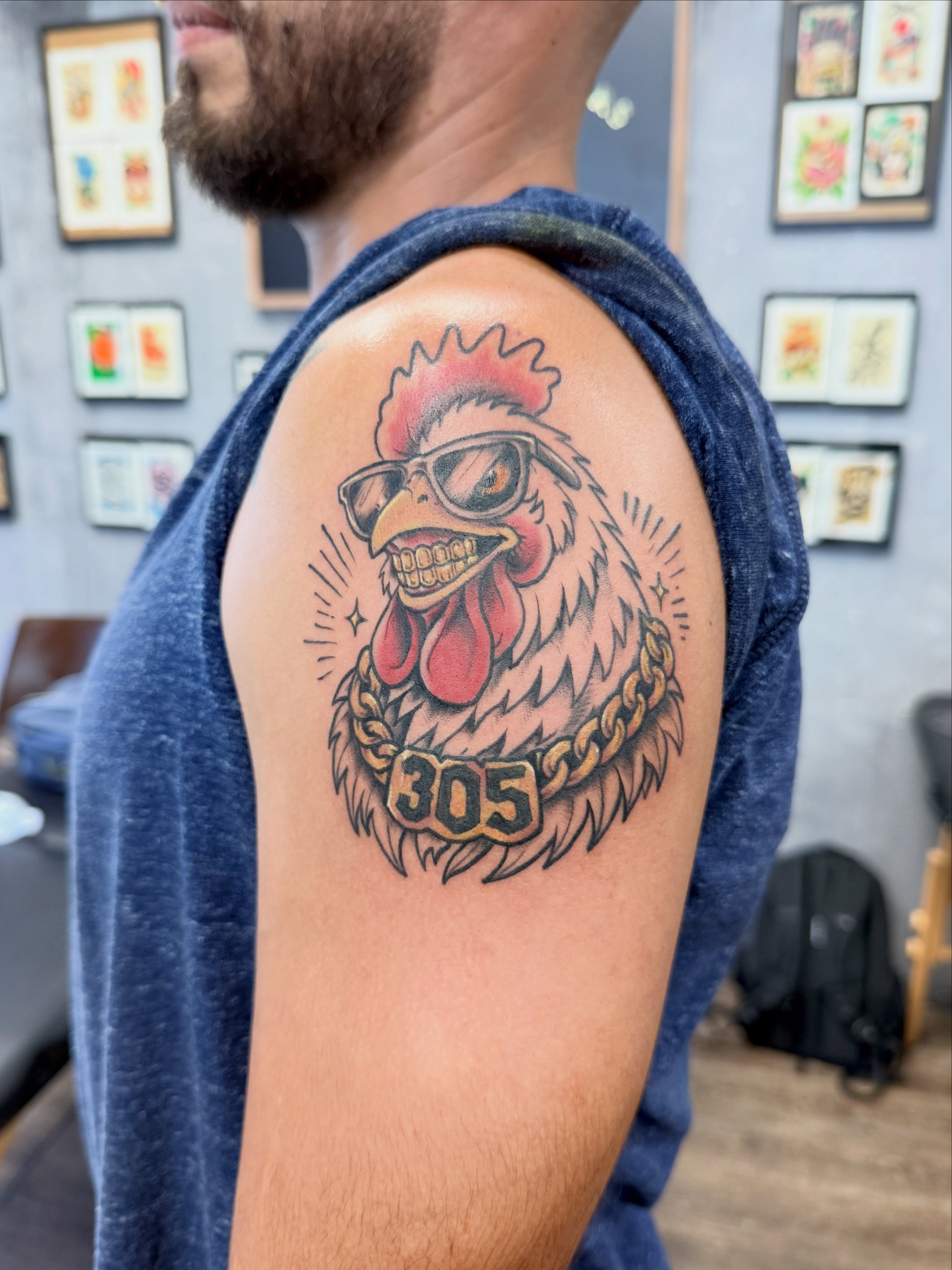 Rooster American traditional tattoo on the shoulder by Chris