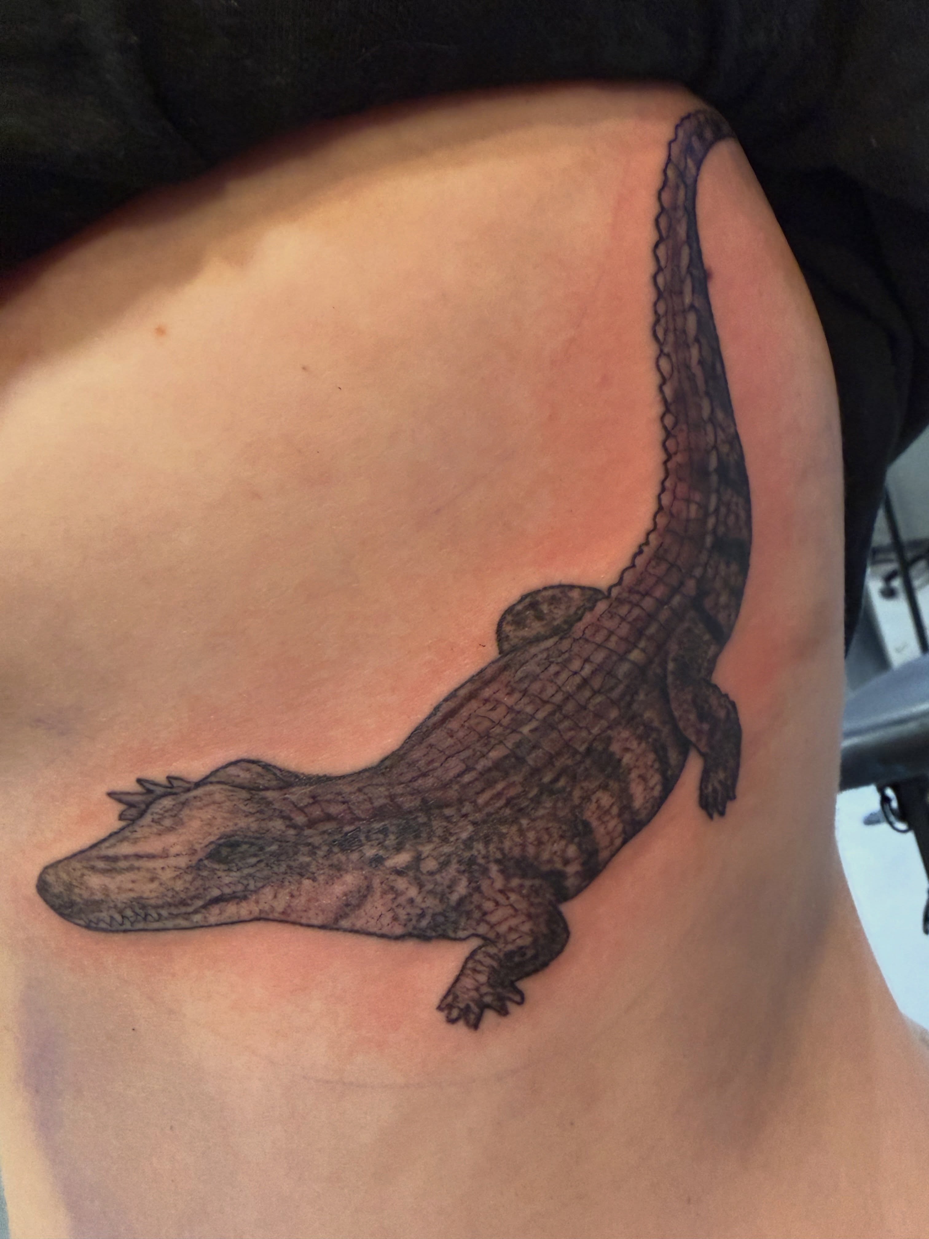 Alligator black and grey tattoo on the thigh by steven