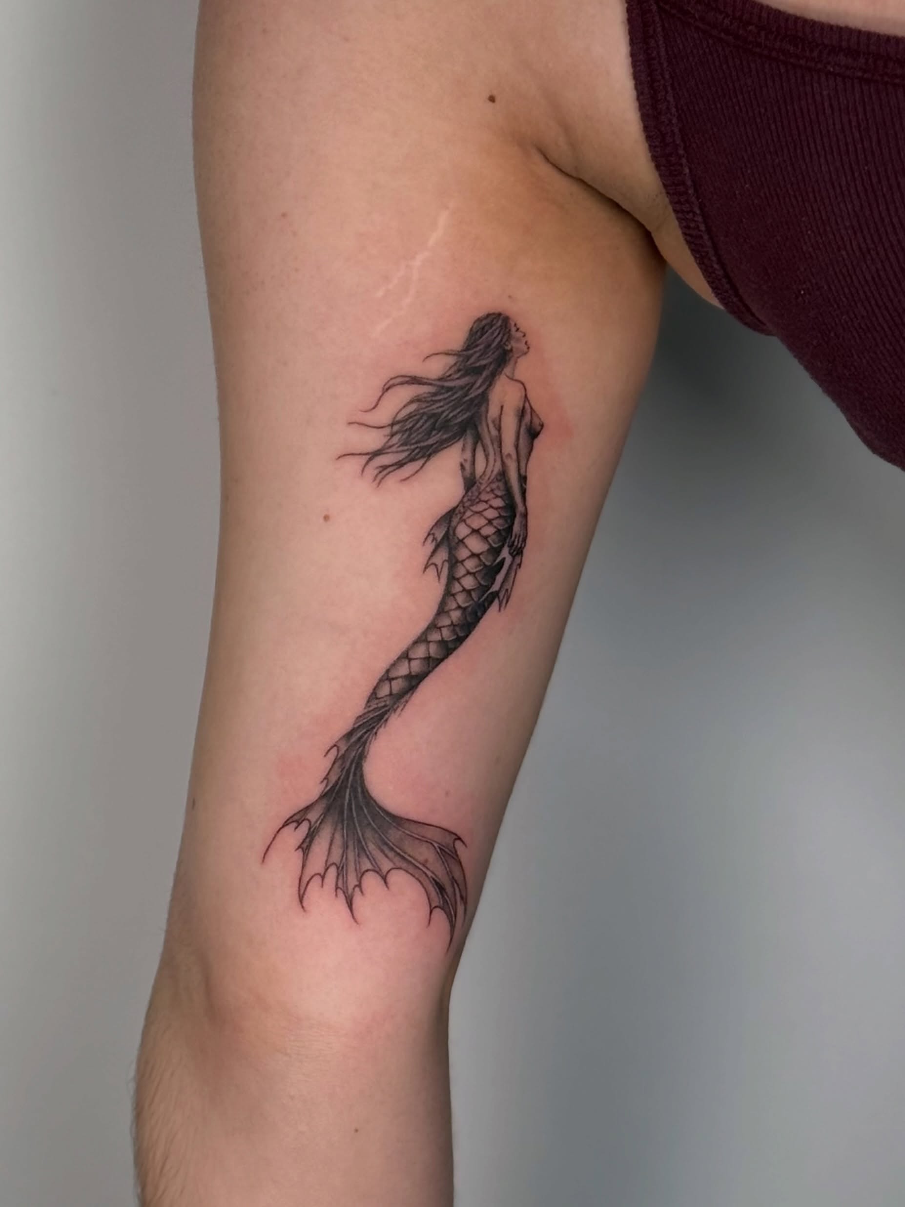 Mermaid black and grey tattoo on the forearm by jaz🌀