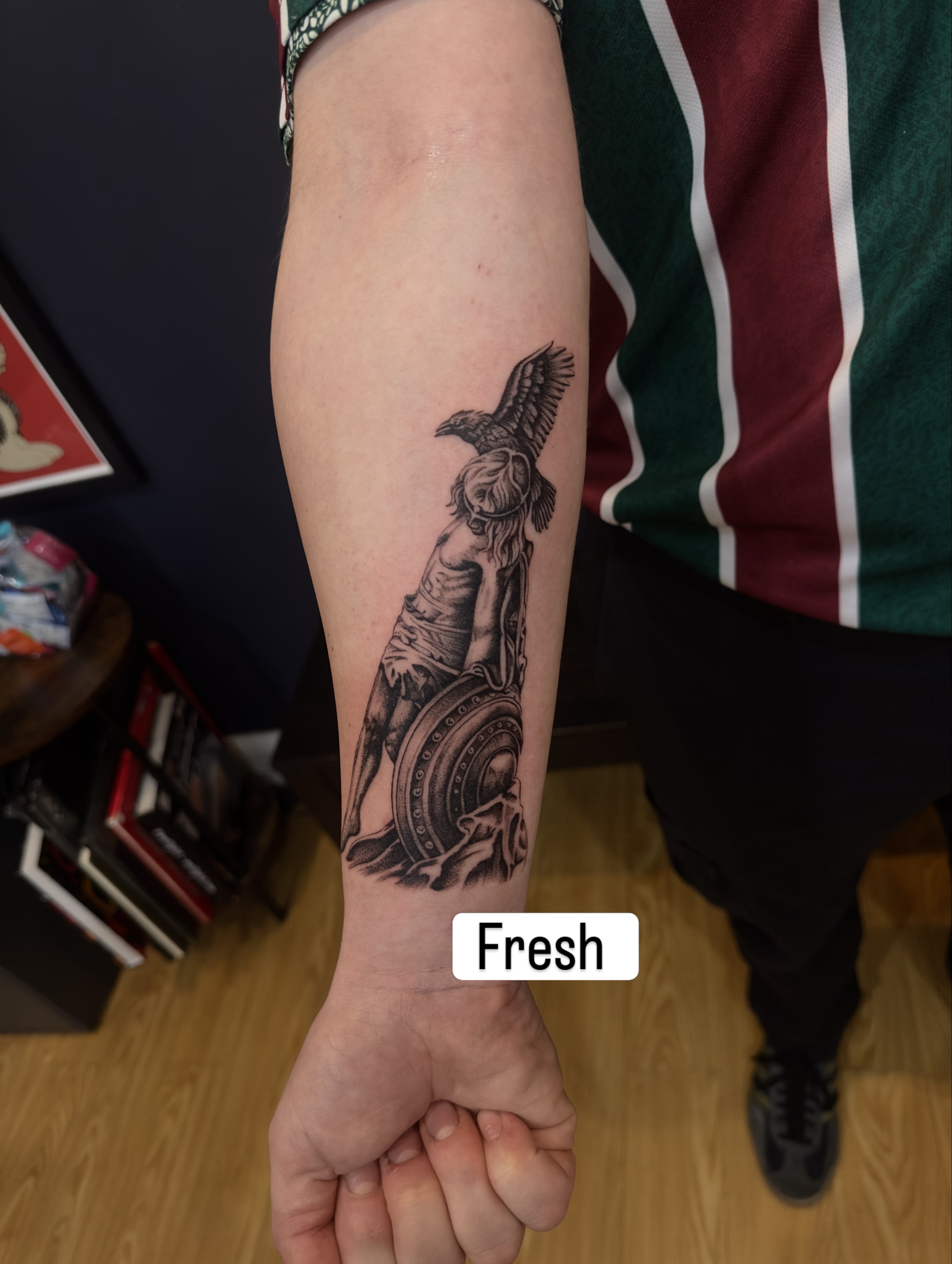 Raven and woman realism tattoo on the forearm by Matt Kearney