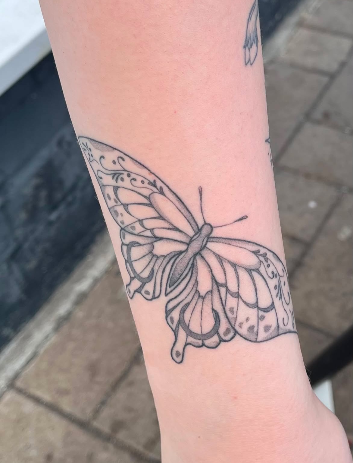 Tattoo by @poppyoliviatattoo — black_and_grey
