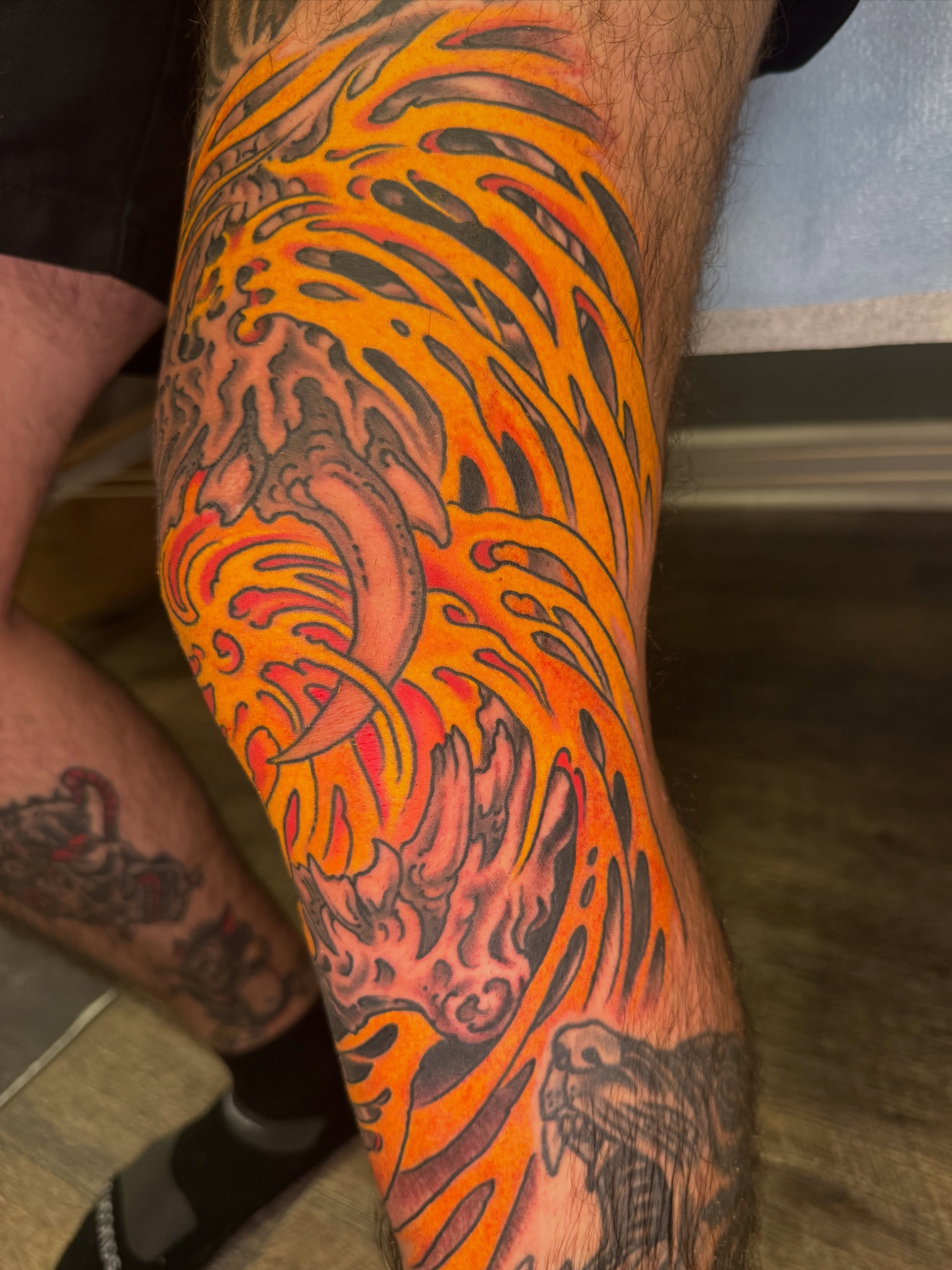 Flame tiger American traditional tattoo on the leg by J Ranno, Richmond, Virginia