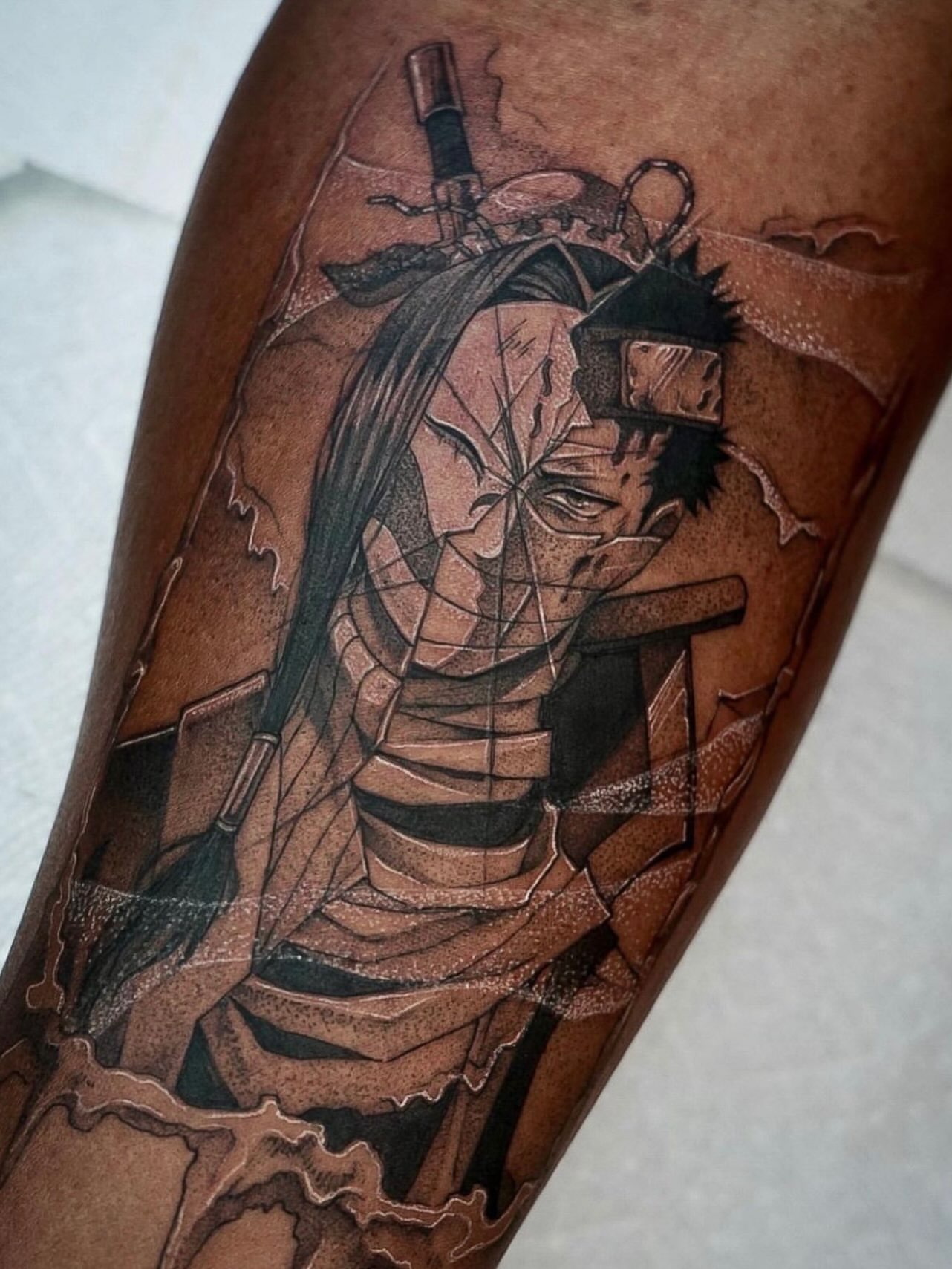 Anime character anime tattoo on the forearm by Chris Jang