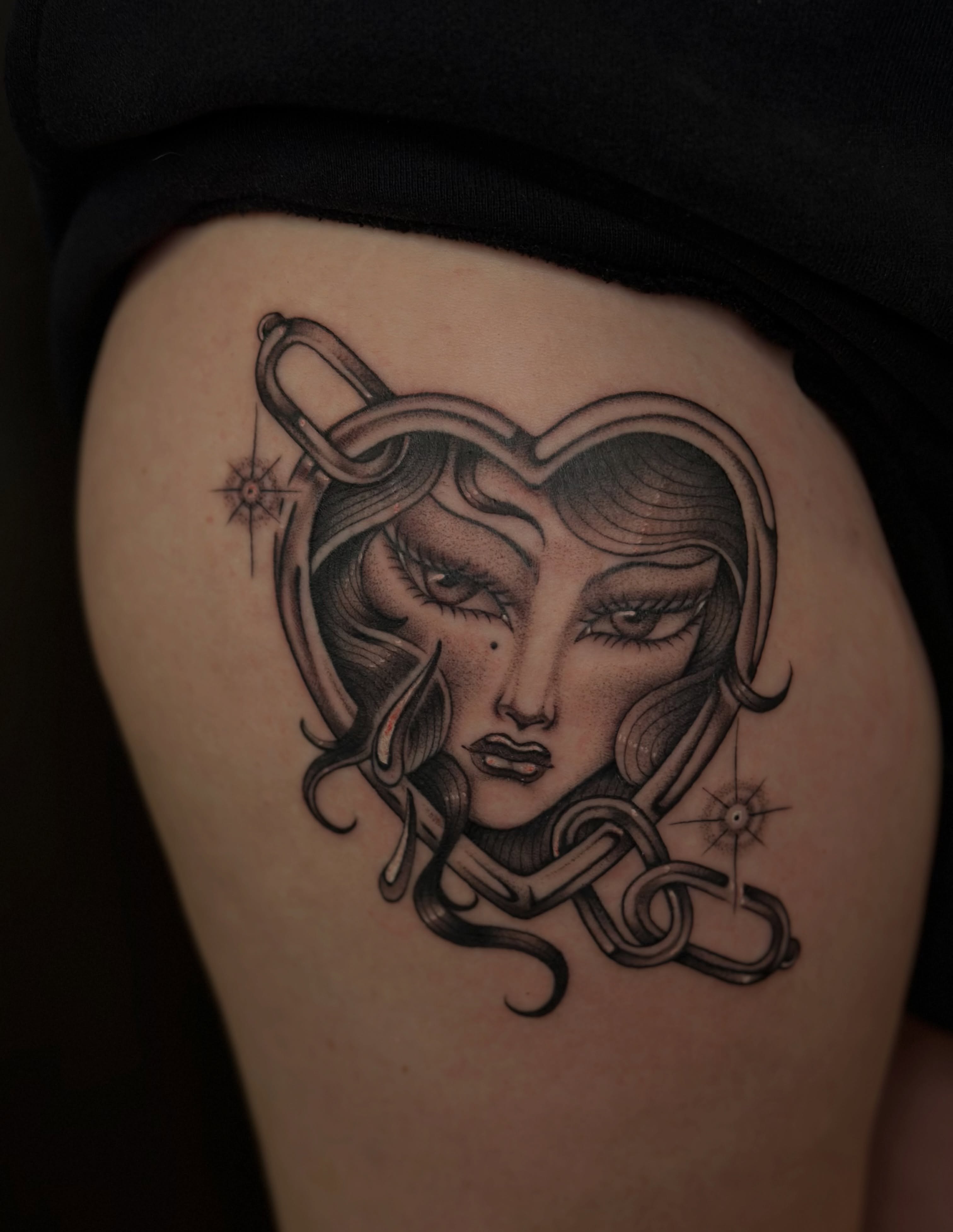 Medusa American traditional tattoo on the thigh by Lauryn Jenesis