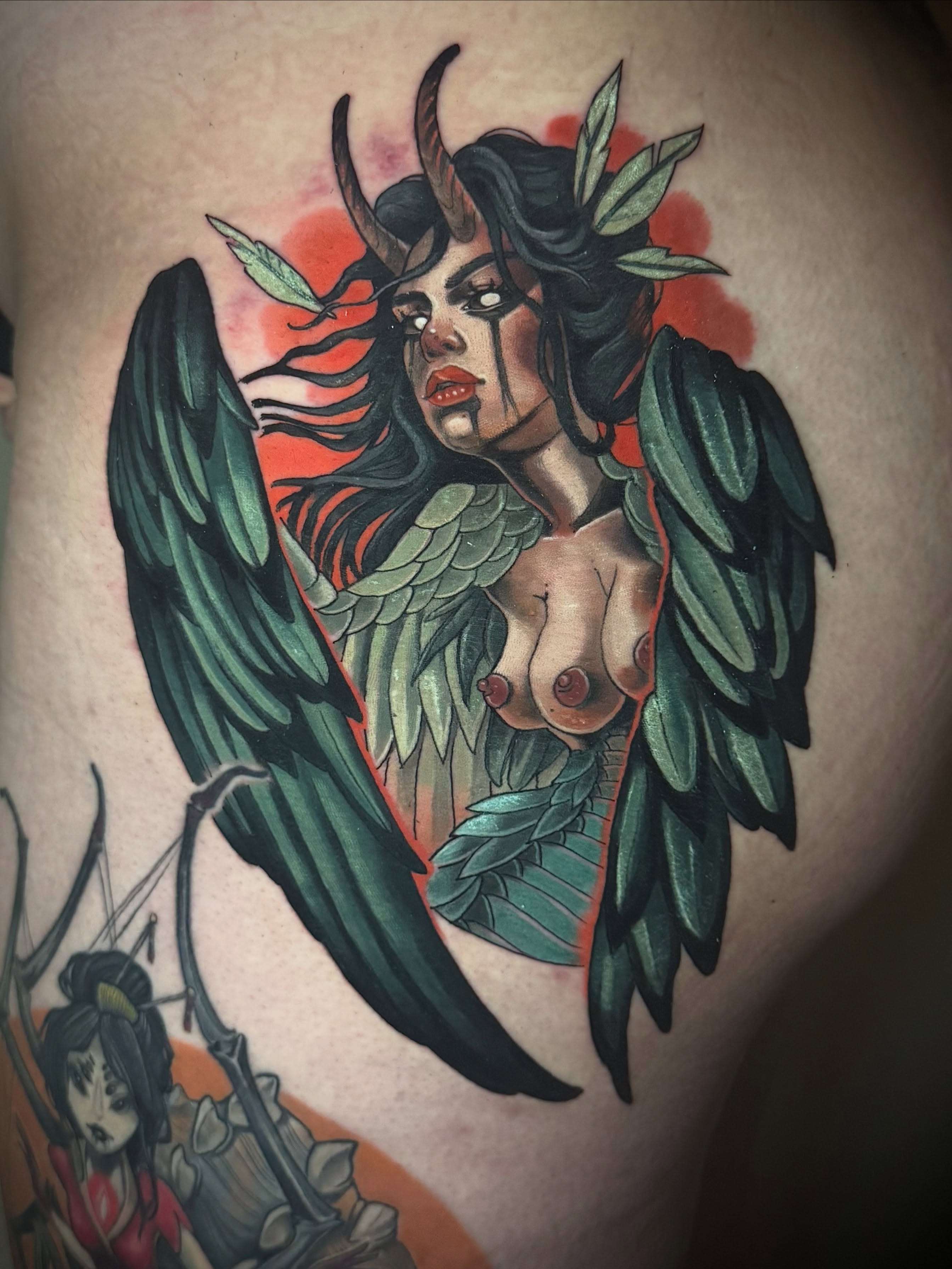 Winged woman American traditional tattoo on the shoulder by Jessica Brown