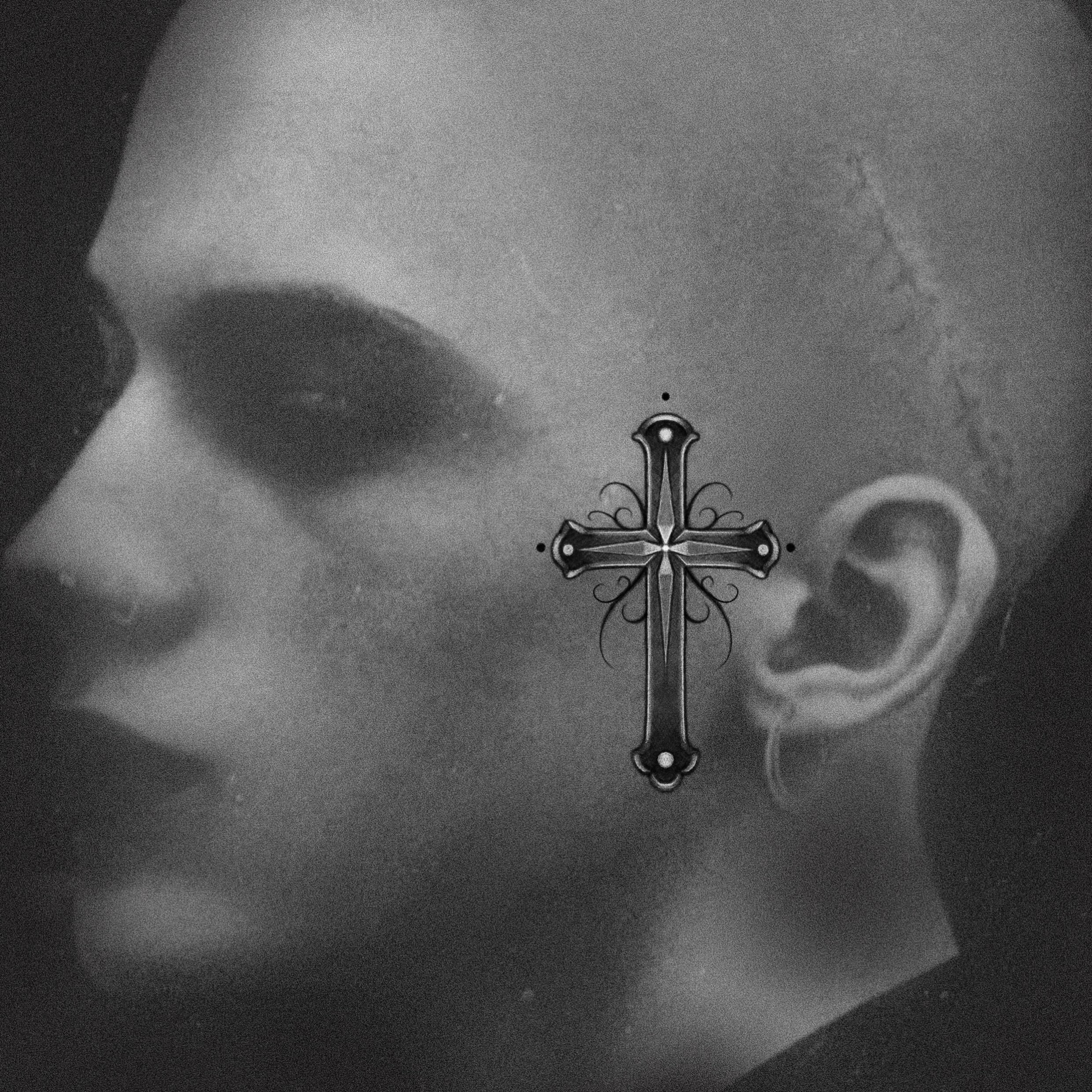 Cross black and grey tattoo on the head by La Hyene