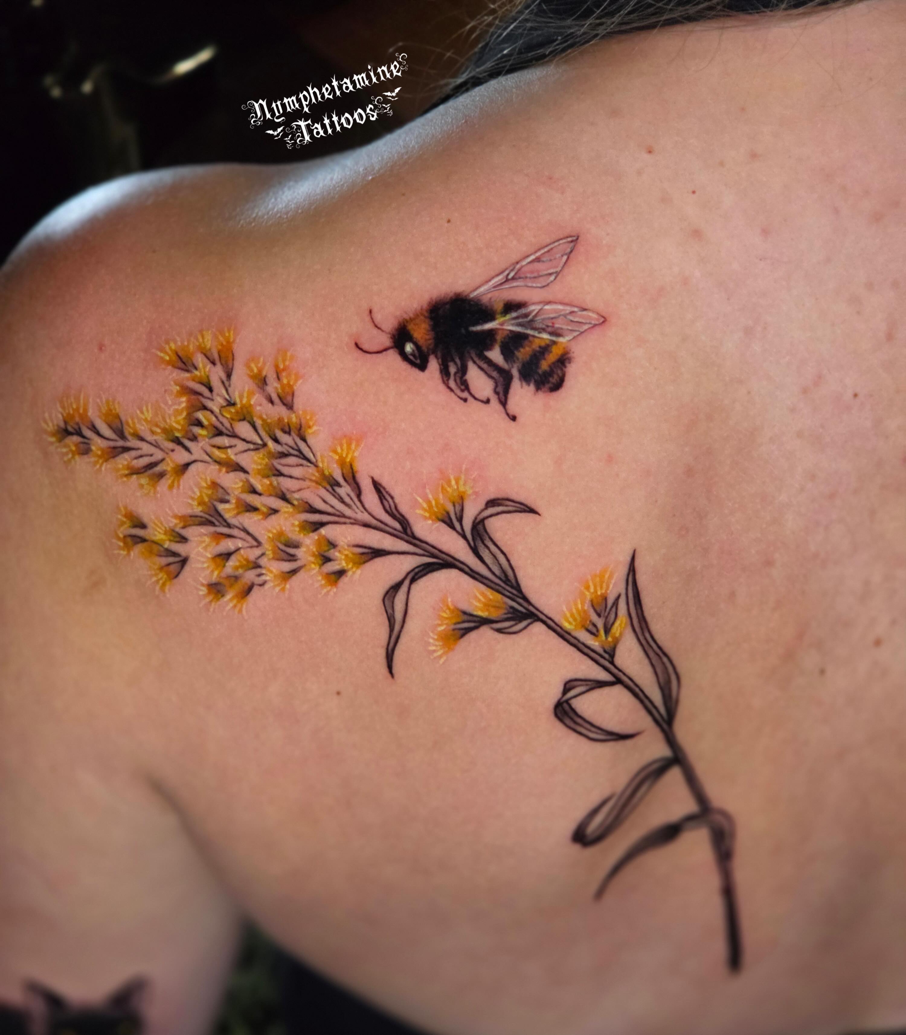 Bee and flower realism tattoo on the shoulder by ๐ธ๐๐๐๐๐๐๐๐
