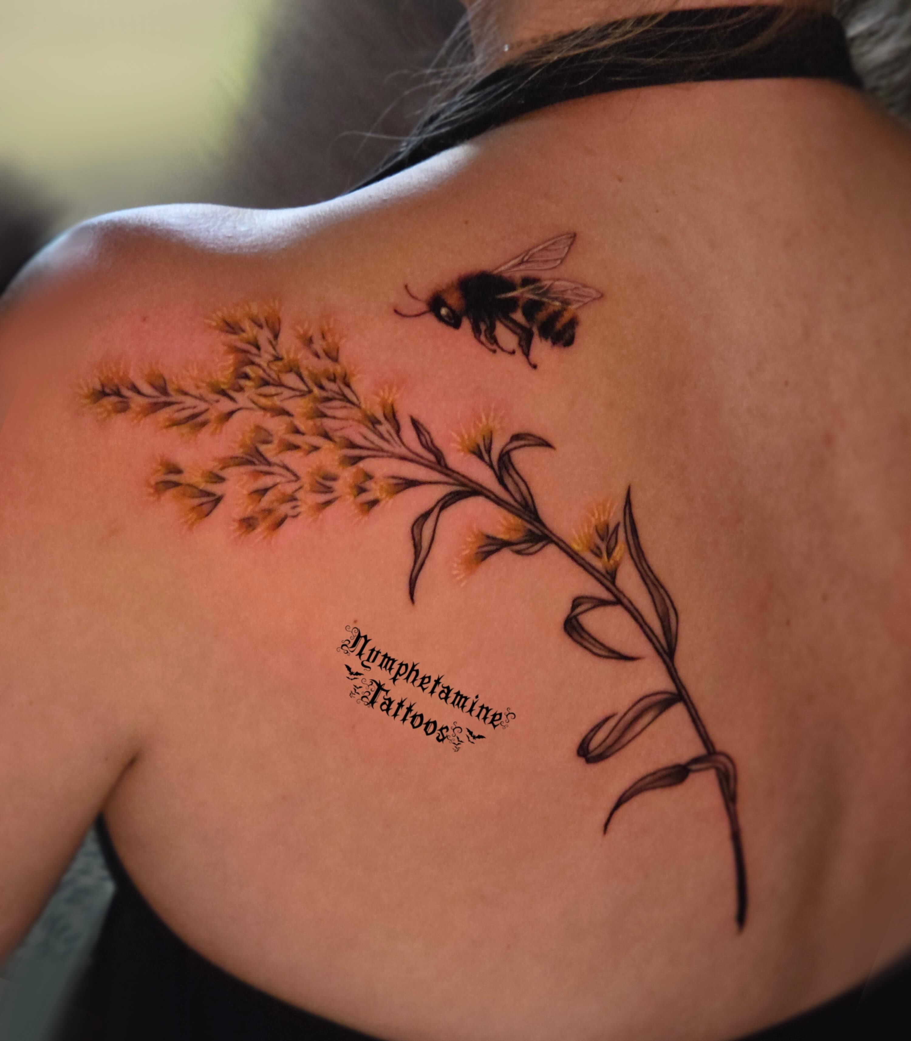 Bee and plant realism tattoo on the shoulder by ๐ธ๐๐๐๐๐๐๐๐