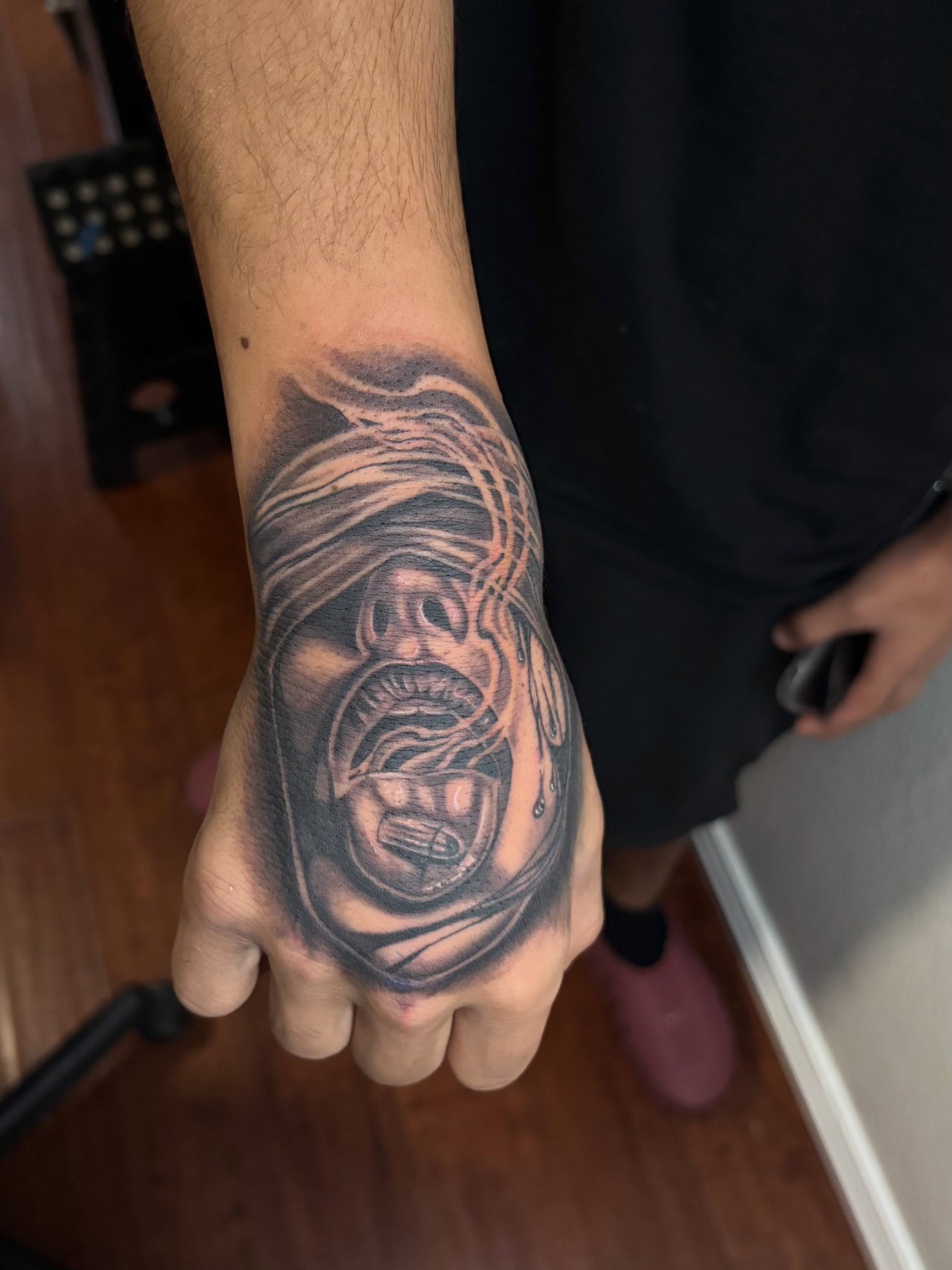 Mummy realism tattoo on the hand by @tattoosbyadrian