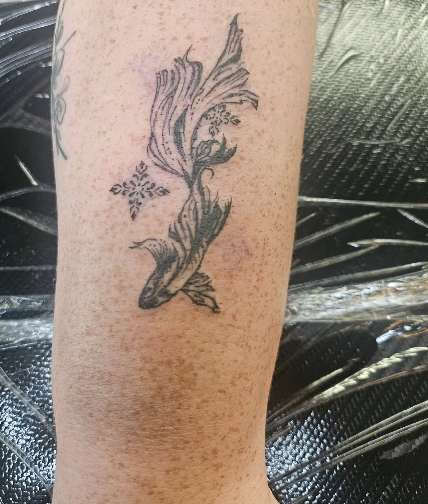 Fish black and grey tattoo on the forearm by ݁˖