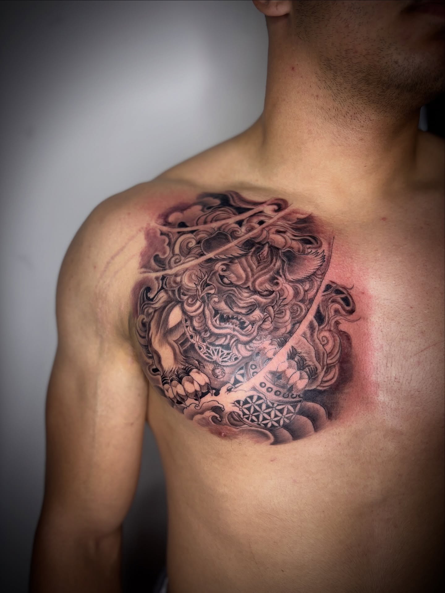 Lion japanese irezumi tattoo on the chest by Adrian Ram 🇬🇾🇵🇭