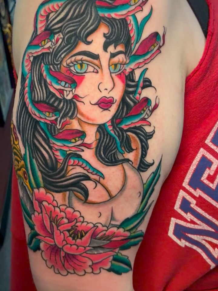 Woman with snakes American traditional tattoo on the forearm by Bre