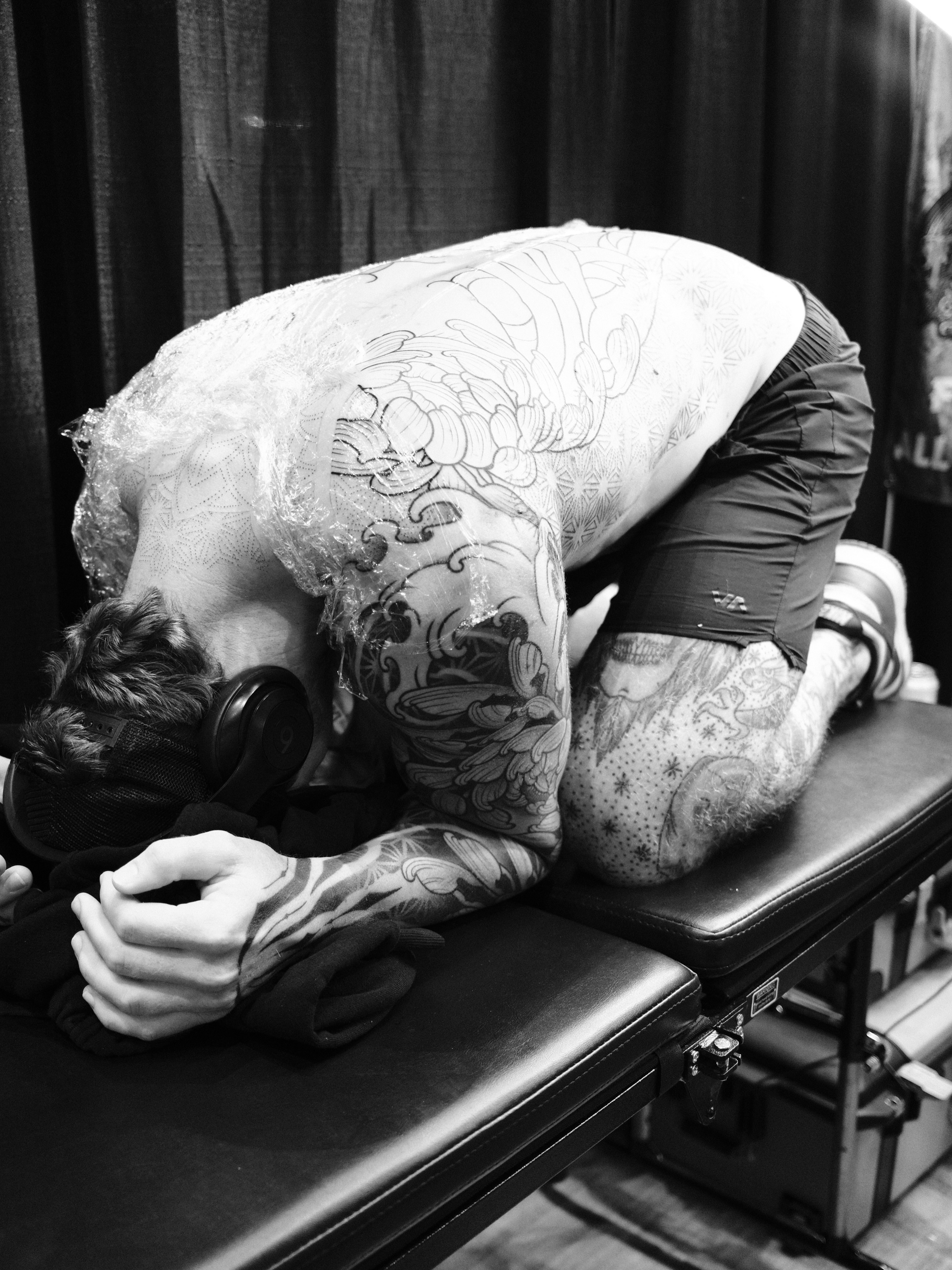 Floral design black and grey tattoo on the torso by Donovan hernandez