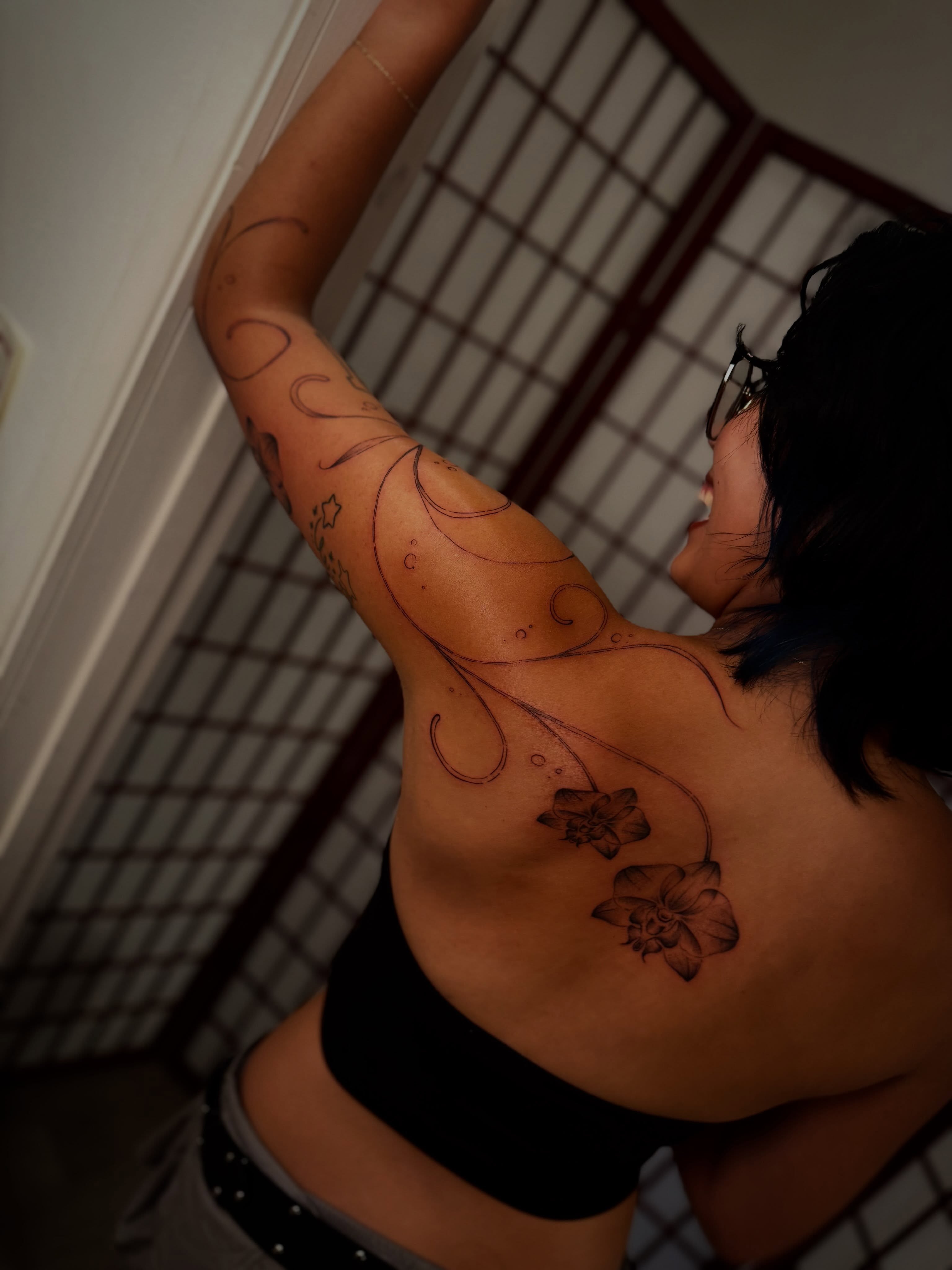 Flowers and vines black and grey tattoo on the back by MISO ⟡ Bay Area Tattoo Artist