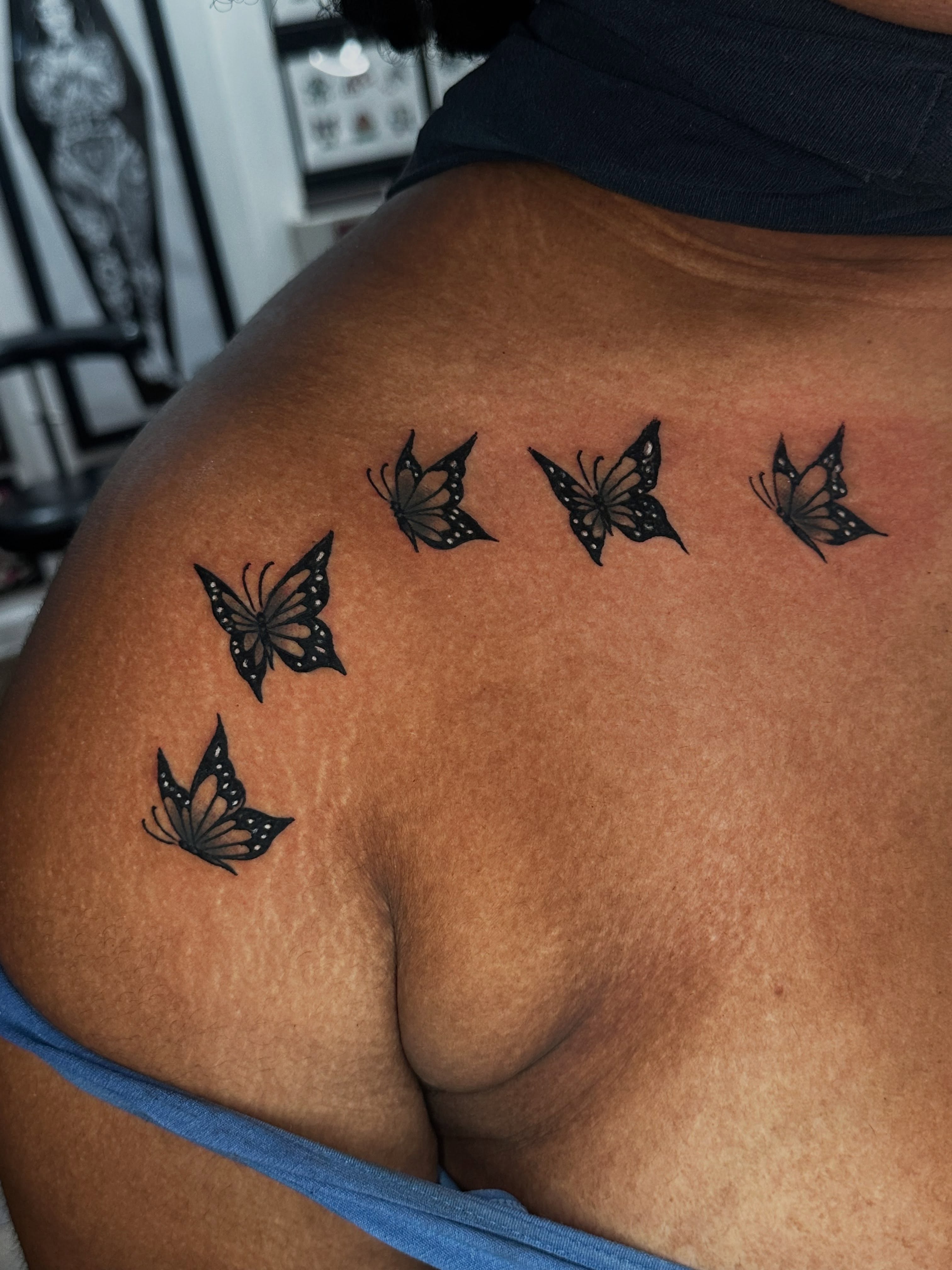 Butterflies black and grey tattoo on the shoulder by Spencer Crawford, Speedway, Indiana