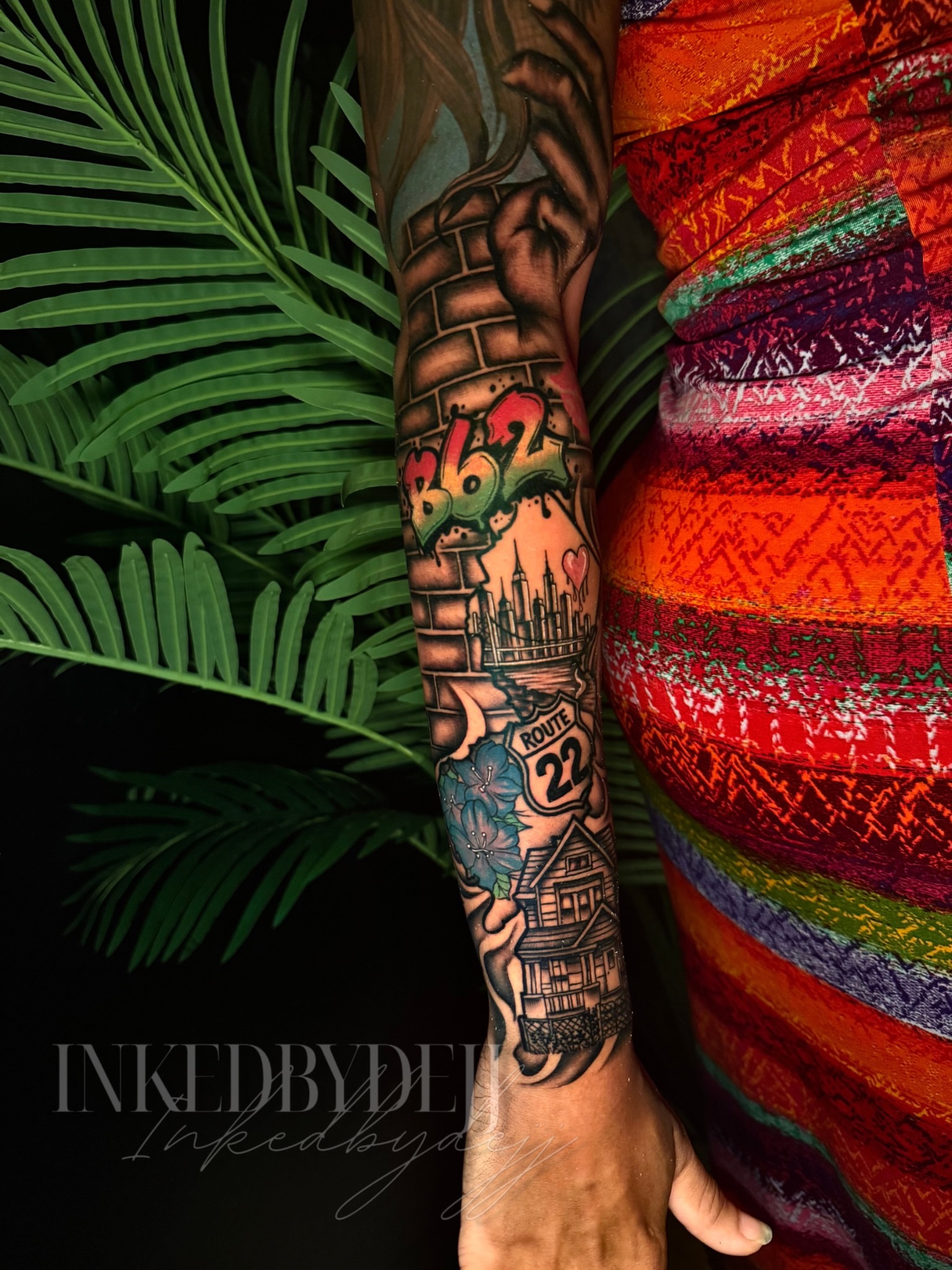 House and route sign black and grey tattoo on the forearm by Inkedbydejj