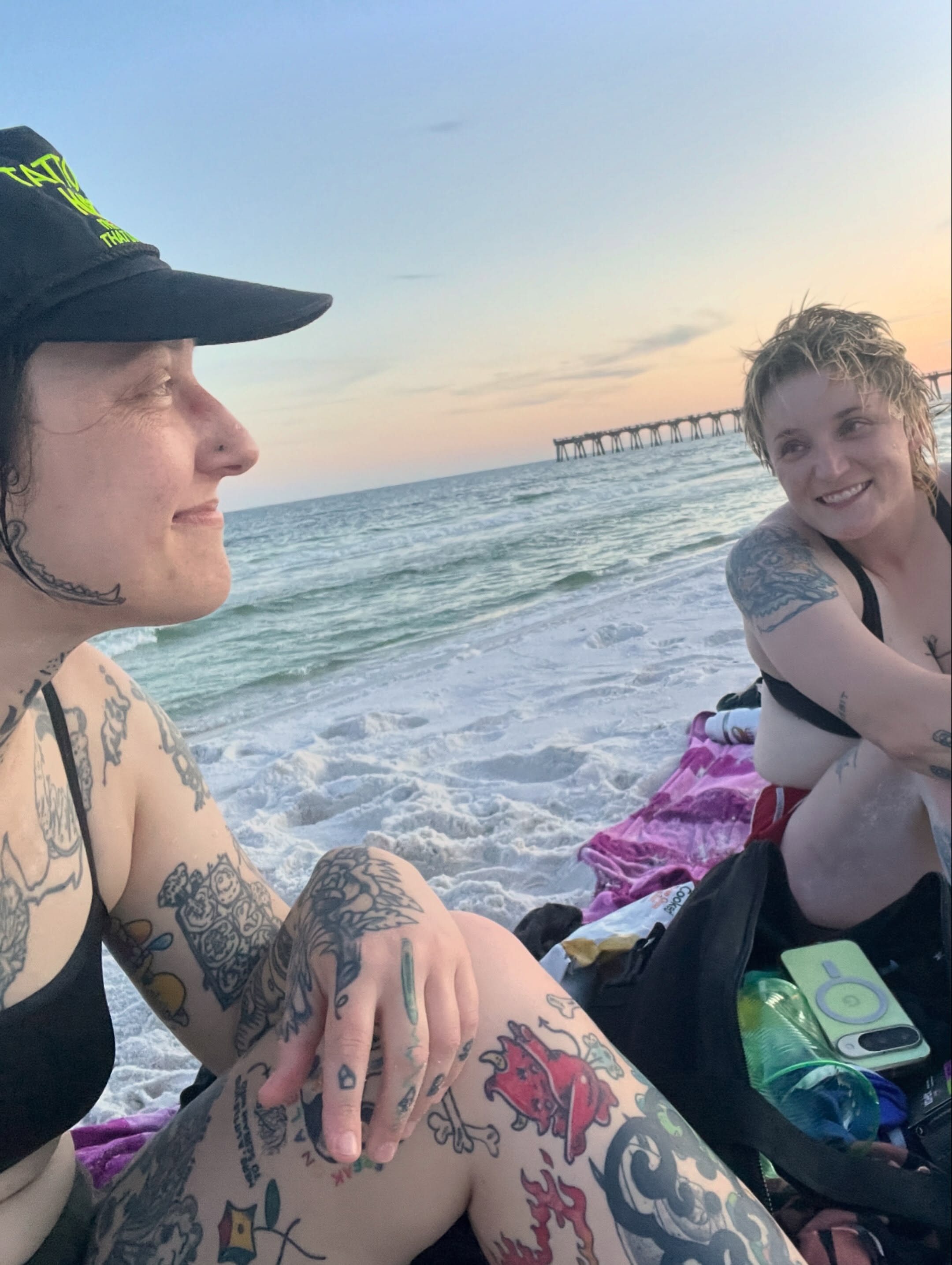 Beach sunset American traditional tattoo on the thigh by Tattoo Kayla