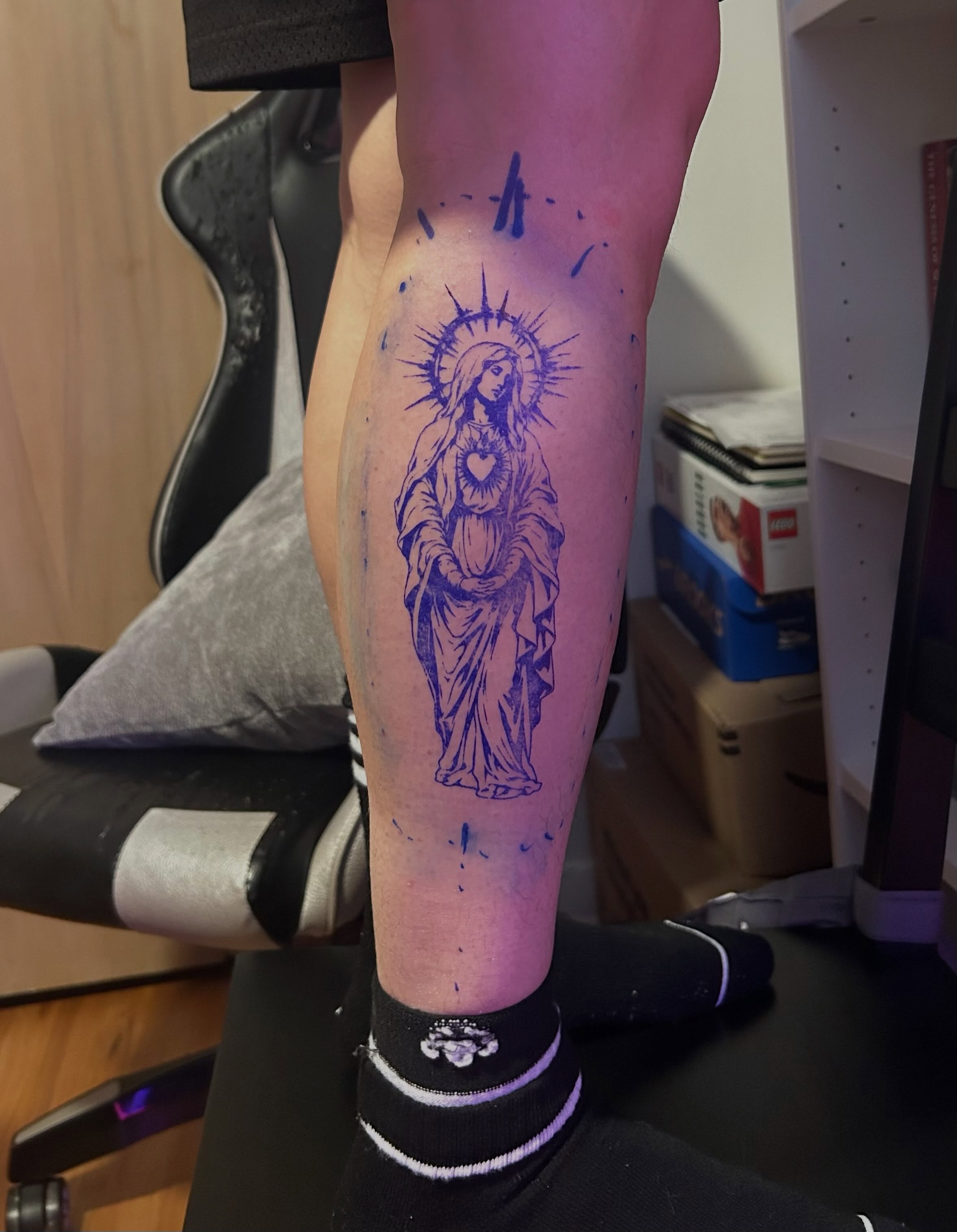Religious figure black and grey tattoo on the leg by @delitotattoos