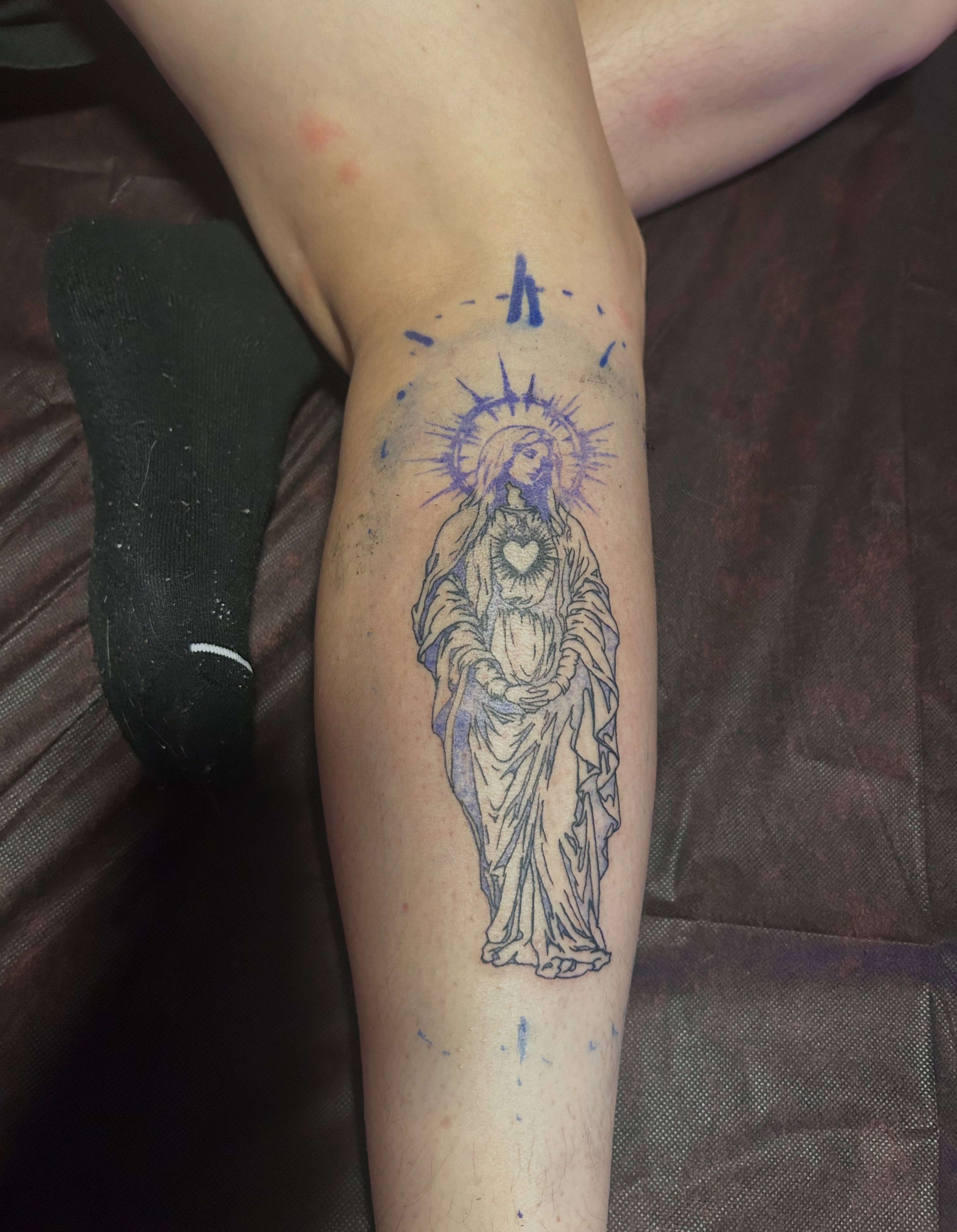 Religious figure black and grey tattoo on the forearm by @delitotattoos