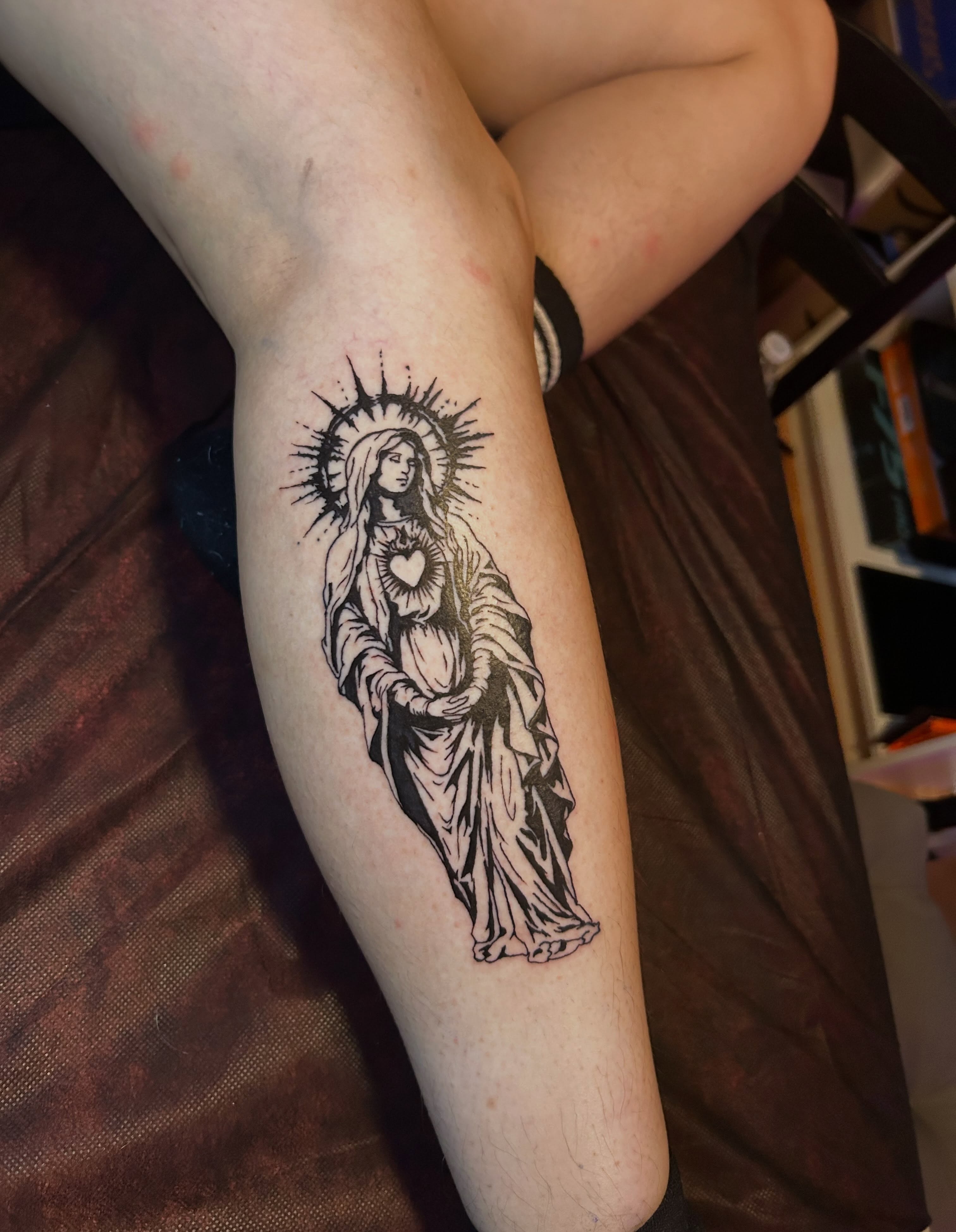 Virgin mary black and grey tattoo on the forearm by @delitotattoos